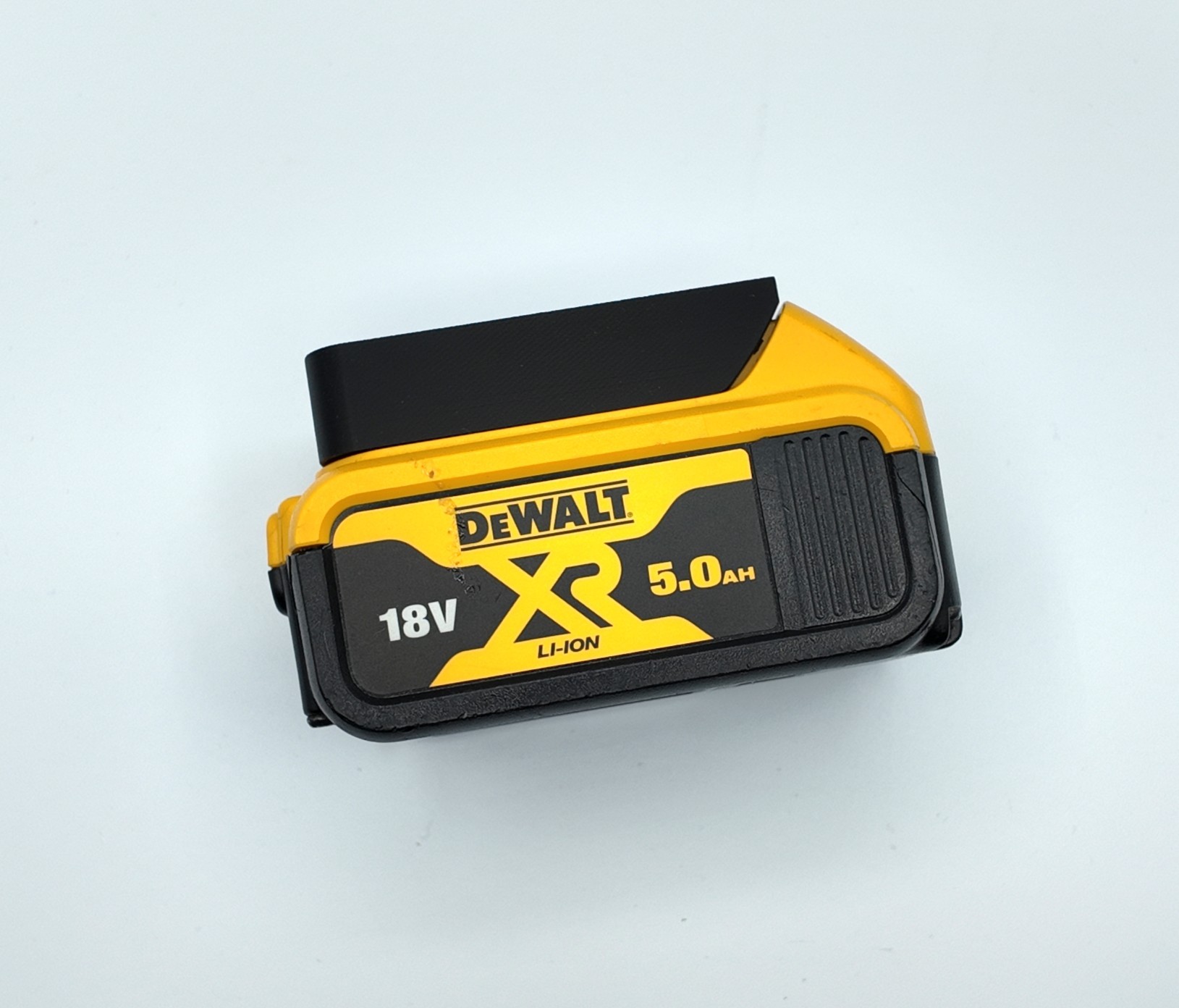 Battery cover and wall mount to fit a Dewalt Battery. Protect and Store up to 20V Tool Batteries. Dust Cap with Screw Mount for DeWalt Battery.