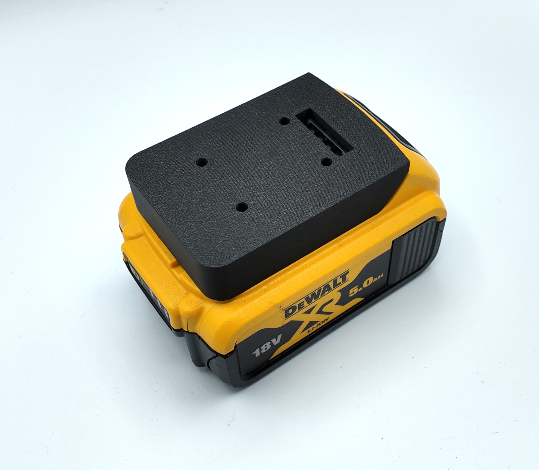 Battery cover and wall mount to fit a Dewalt Battery. Protect and Store up to 20V Tool Batteries. Dust Cap with Screw Mount for DeWalt Battery.