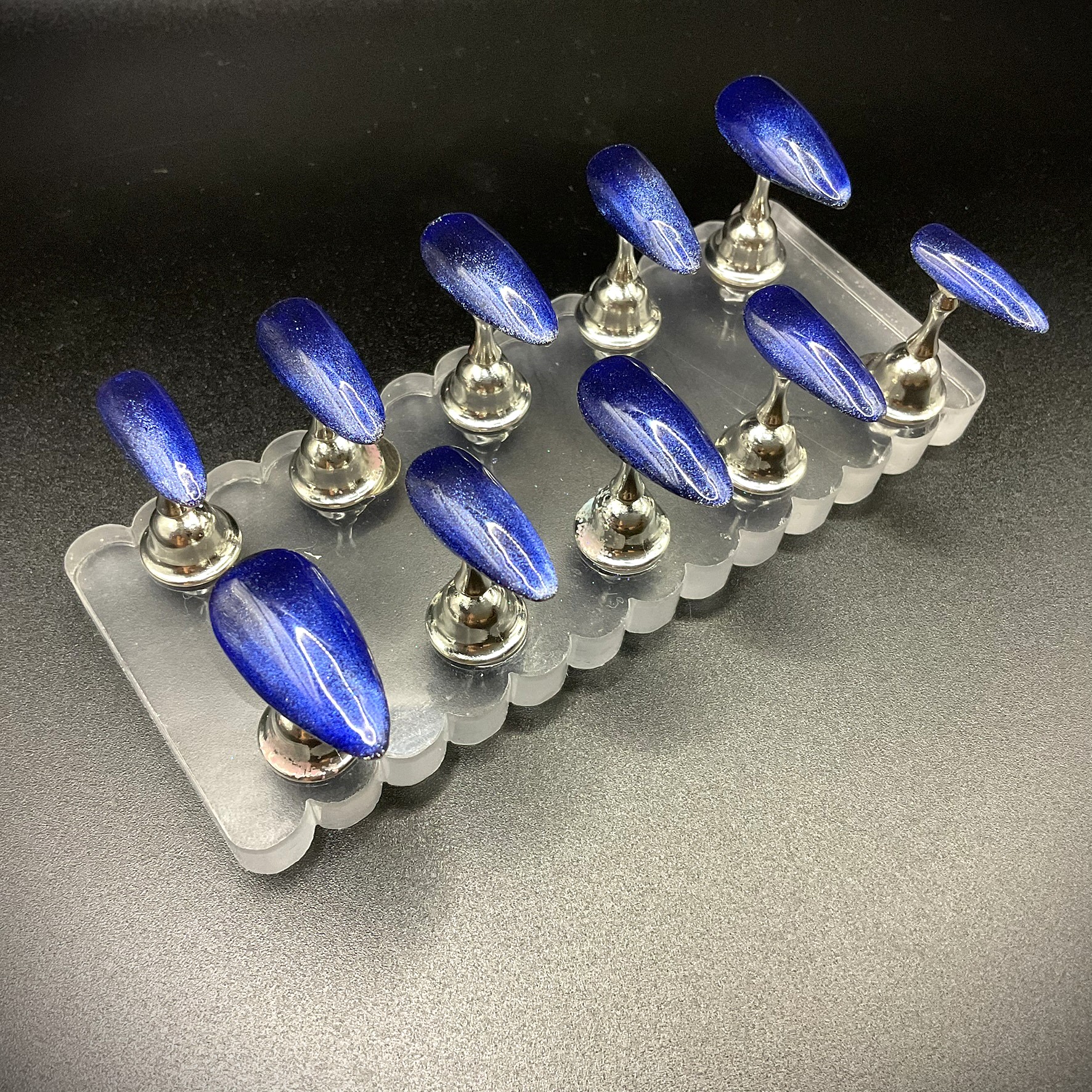 Dark blue cat eye tips - Almond Medium