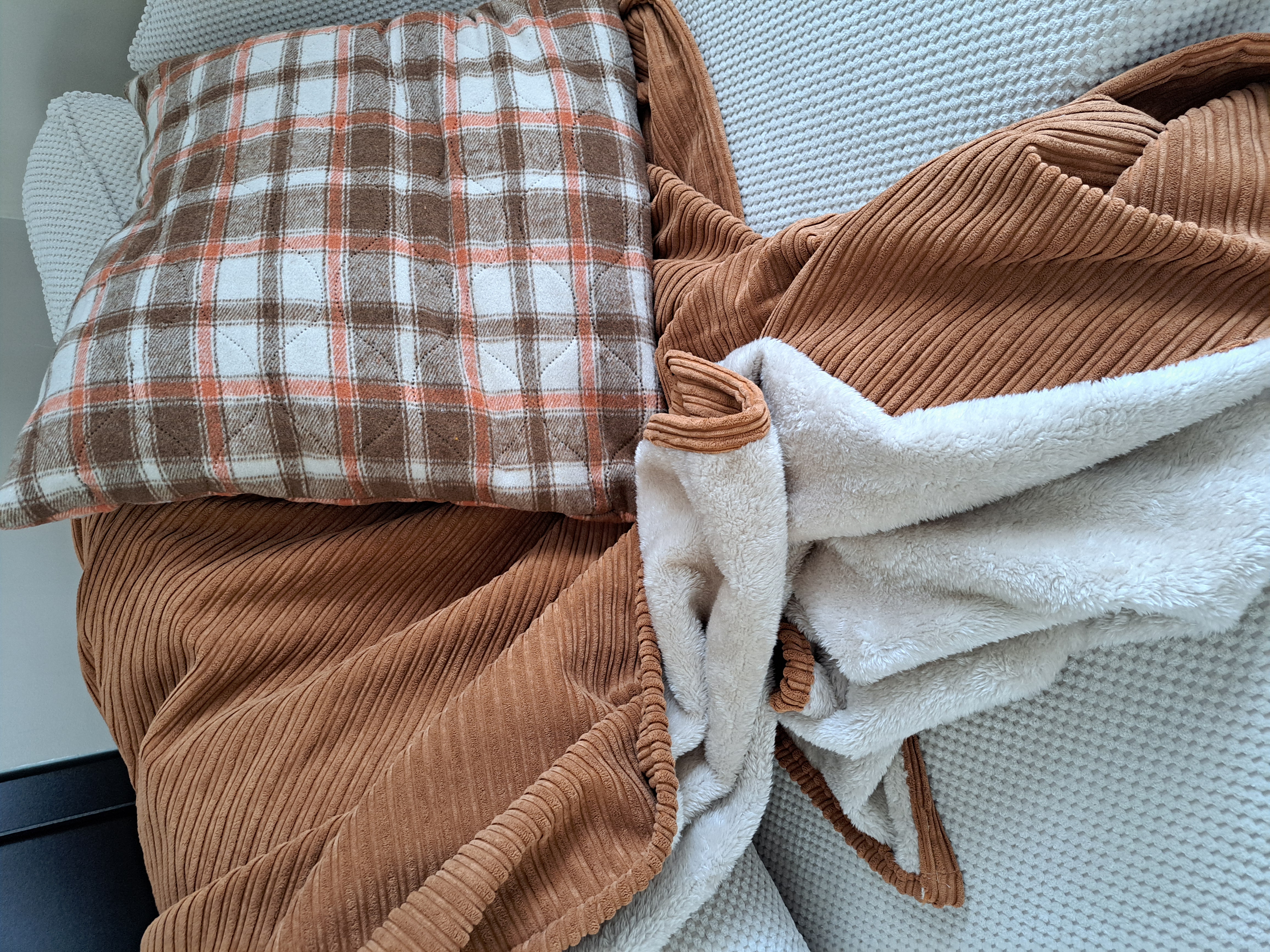 Housse coussin à carreaux