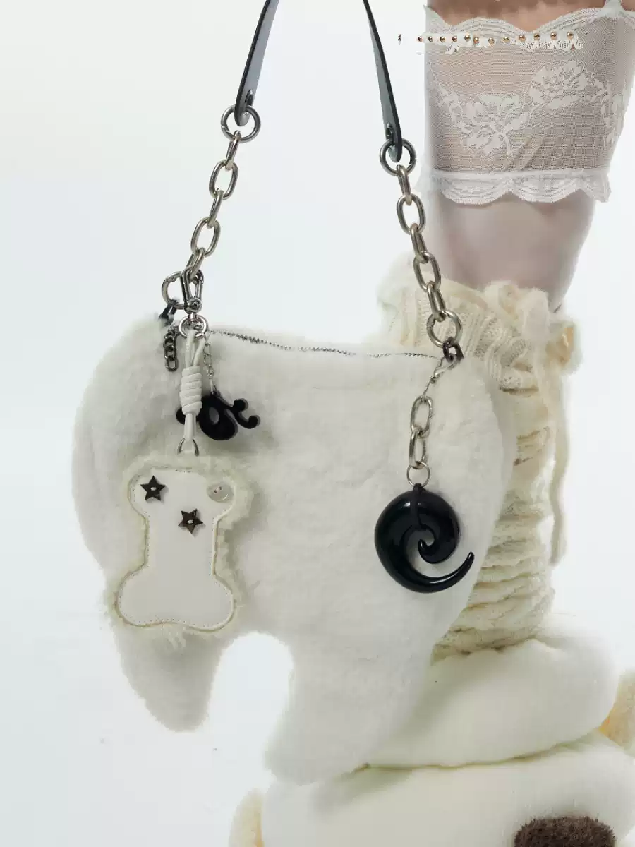 IRREGULAR TOOTH PLUSH HANDBAG