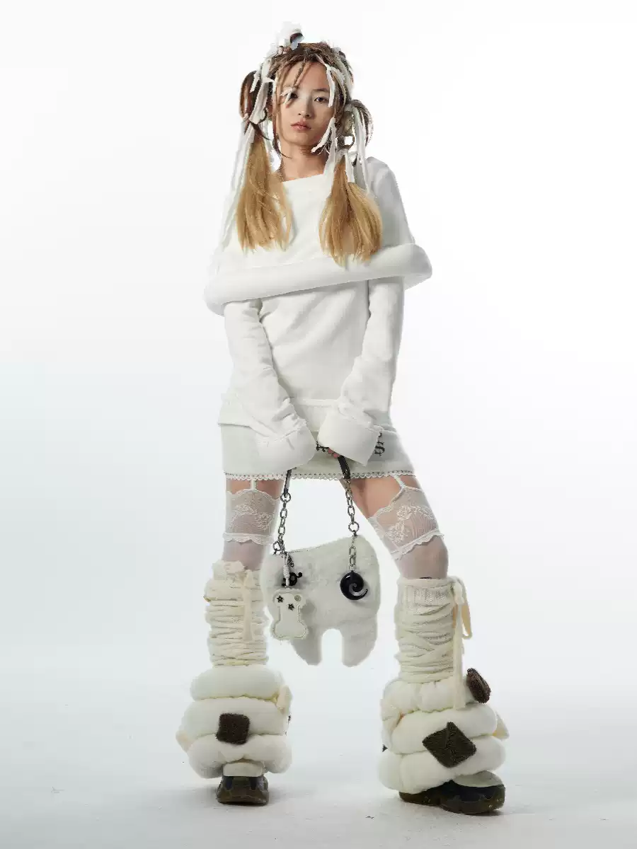 IRREGULAR TOOTH PLUSH HANDBAG