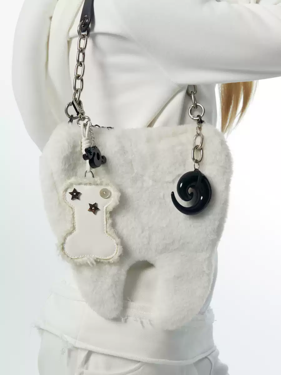 IRREGULAR TOOTH PLUSH HANDBAG