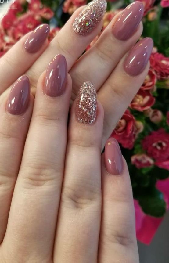 Elegant Nude and Glitter Manicure