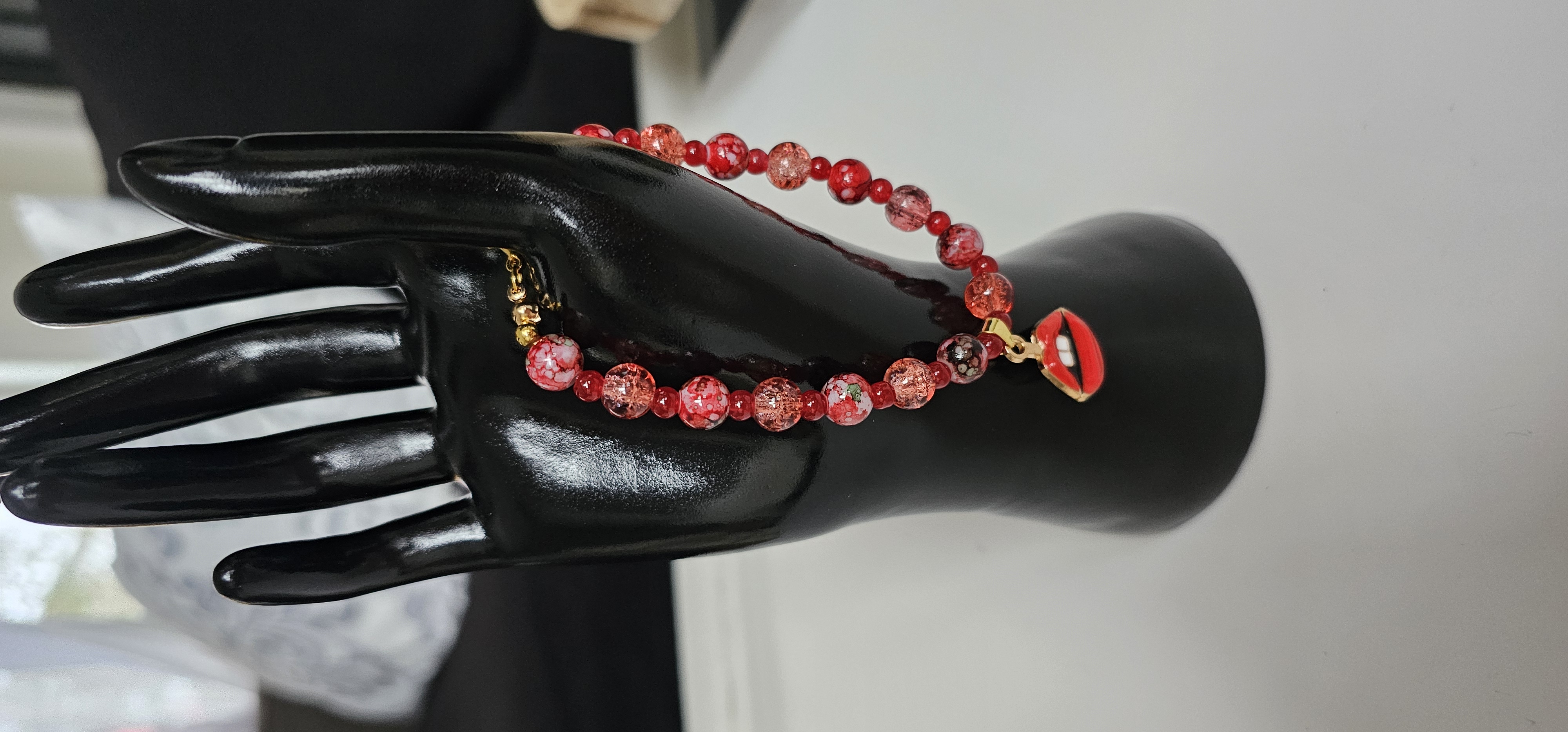 Red Beaded Bracelet with Lip Charm