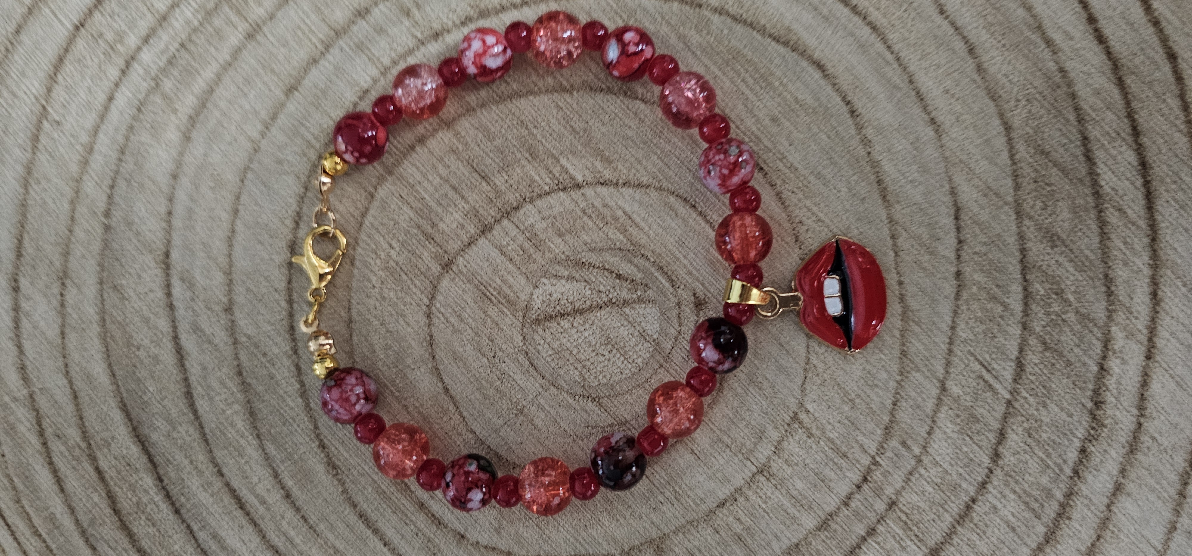 Red Beaded Bracelet with Lip Charm