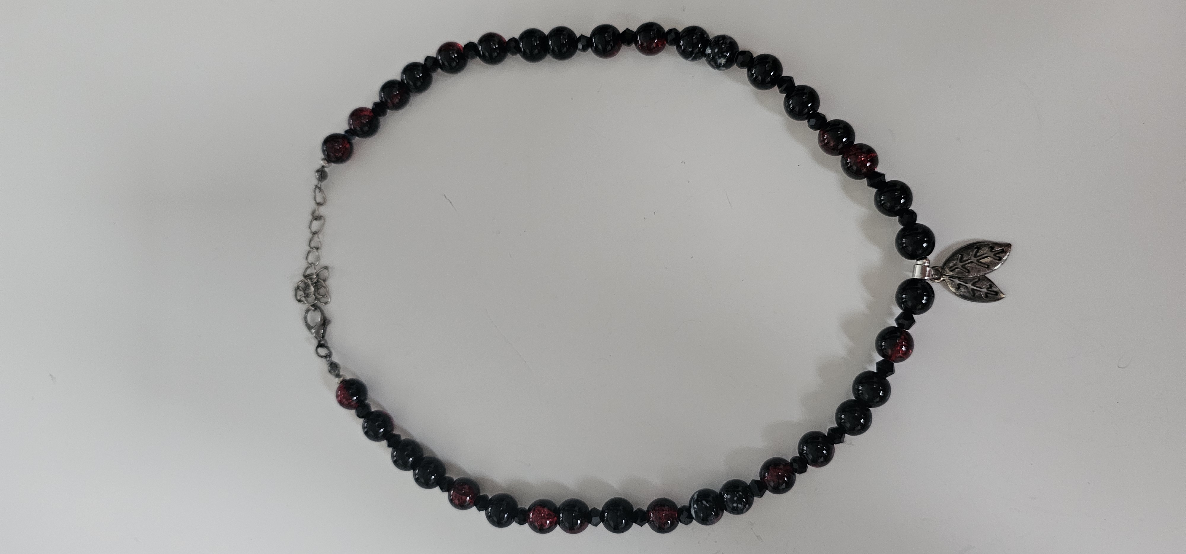 Black Beaded Necklace with Leaf Charm