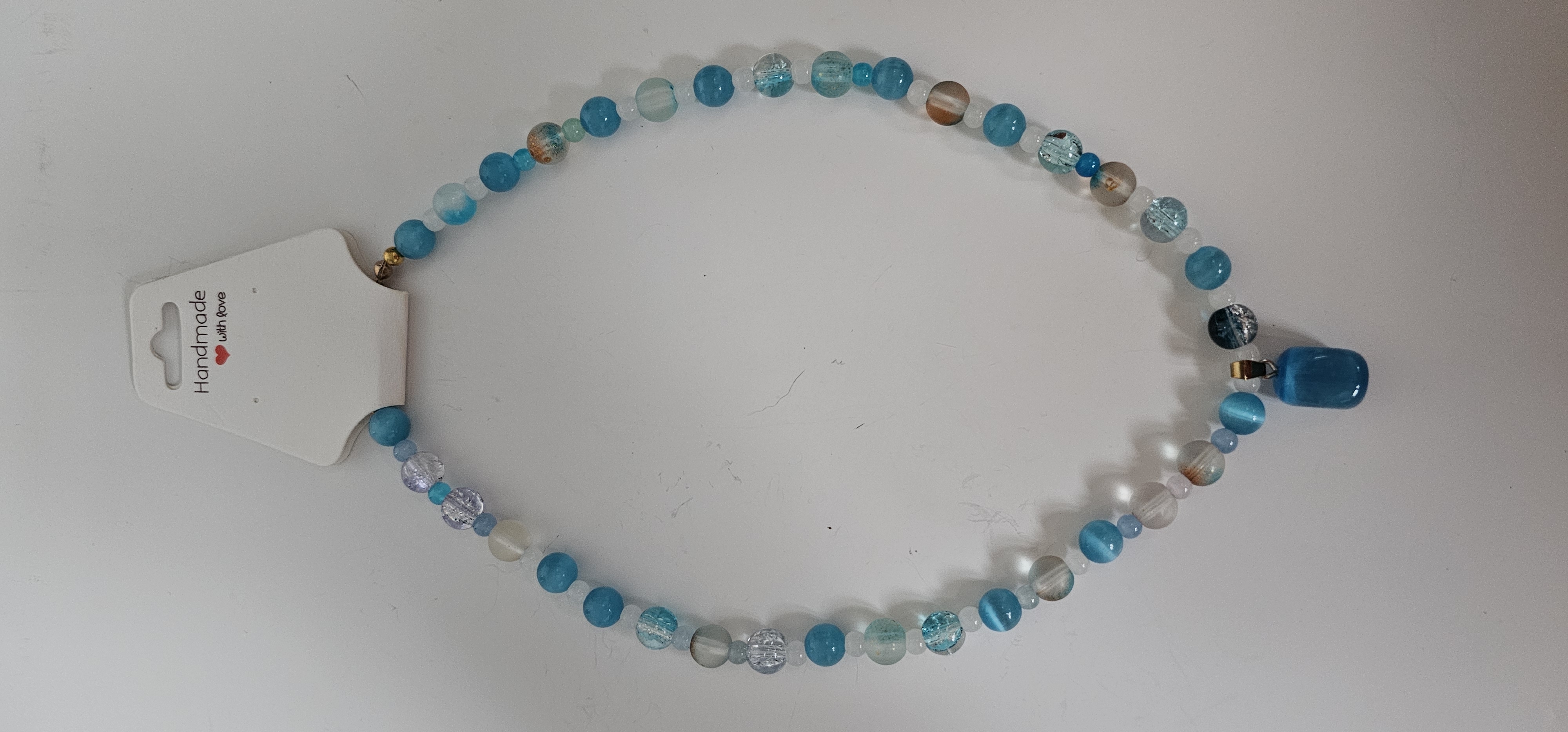 Blue and White Glass Bead Necklace with Blue Stone Pendant