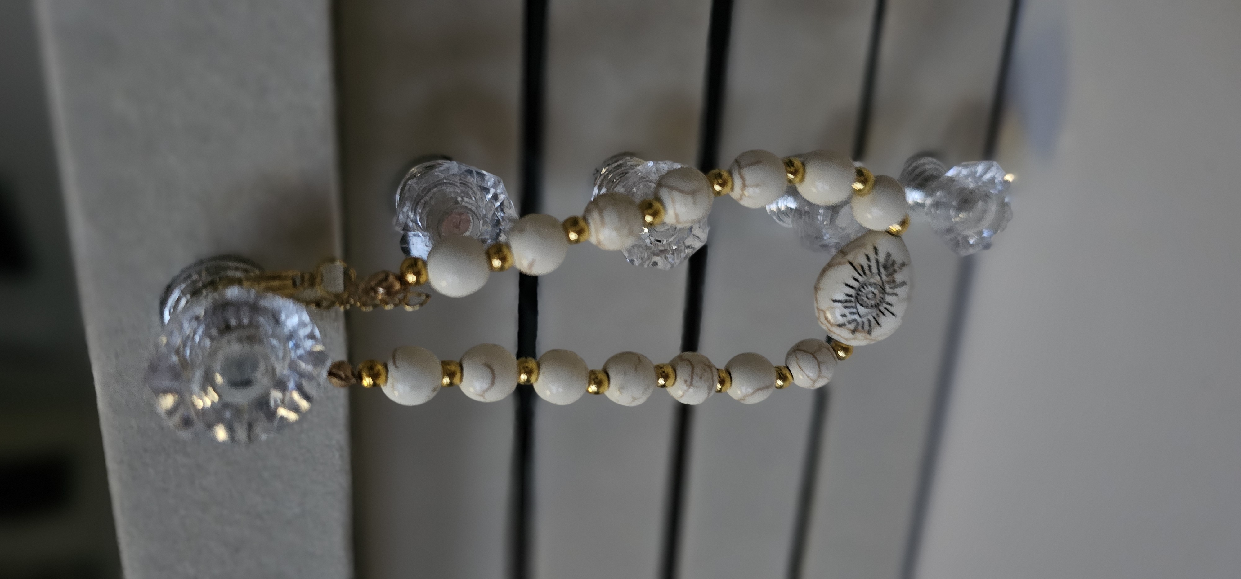 White Beaded Sun Symbol Bracelet