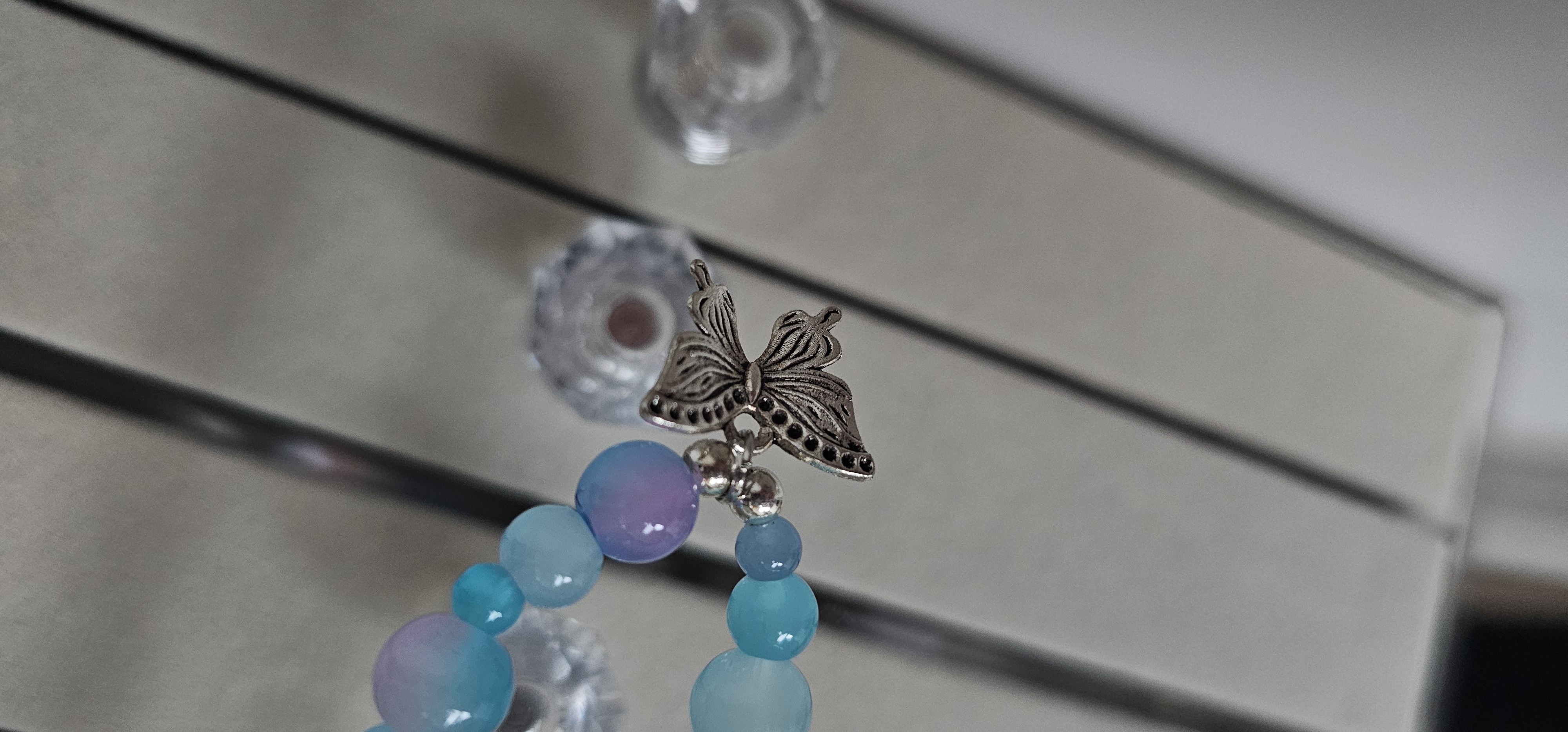 Blue Beaded Bracelet with Butterfly Charm