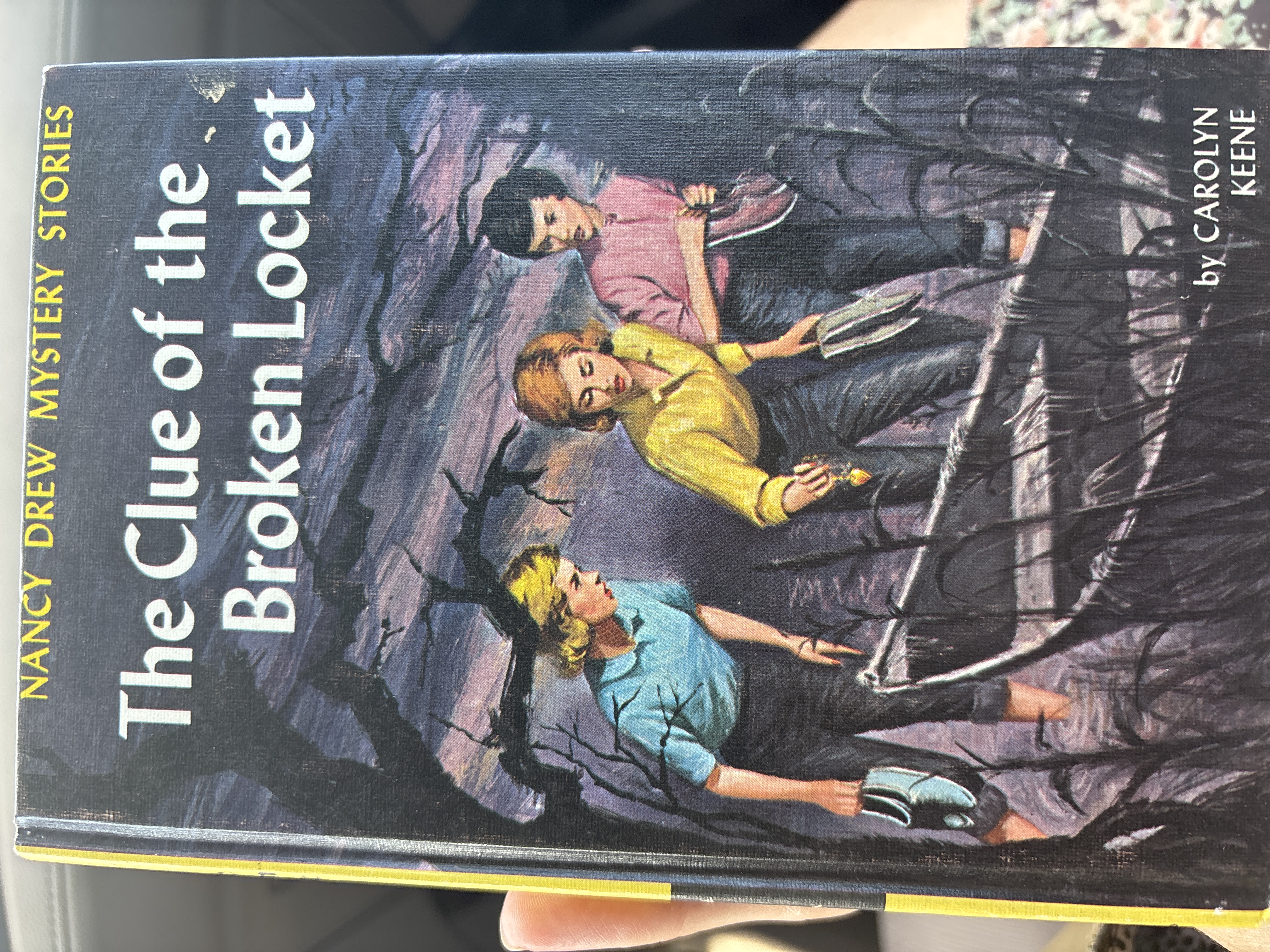 The Clue of the Broken Locket