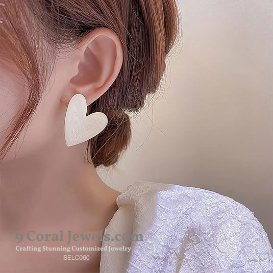 925% Sterling Silver Heart-Shaped Mother of Pearl Earrings