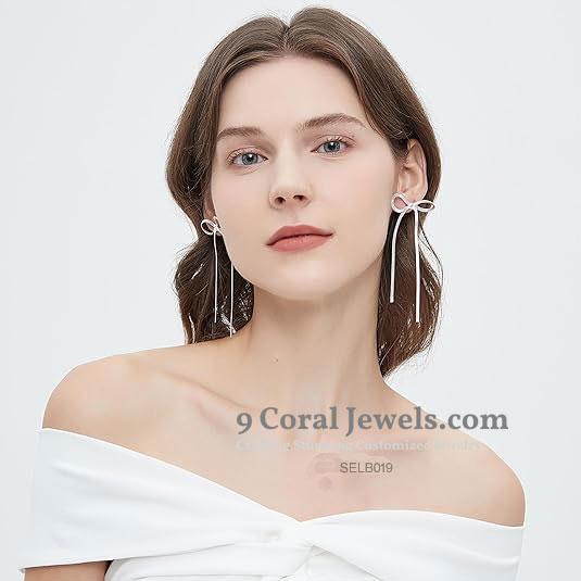Silver Bow Tie Drop Earrings