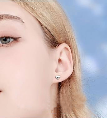 Heart-shaped silver stud earrings