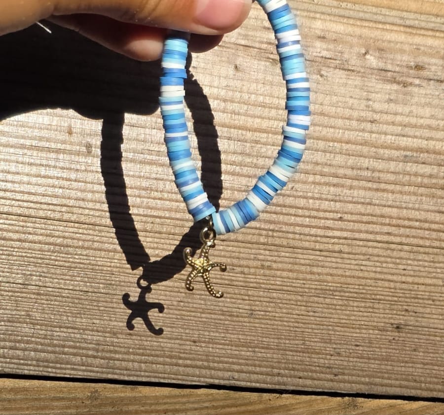 Blauw armbandje met zeester bedel