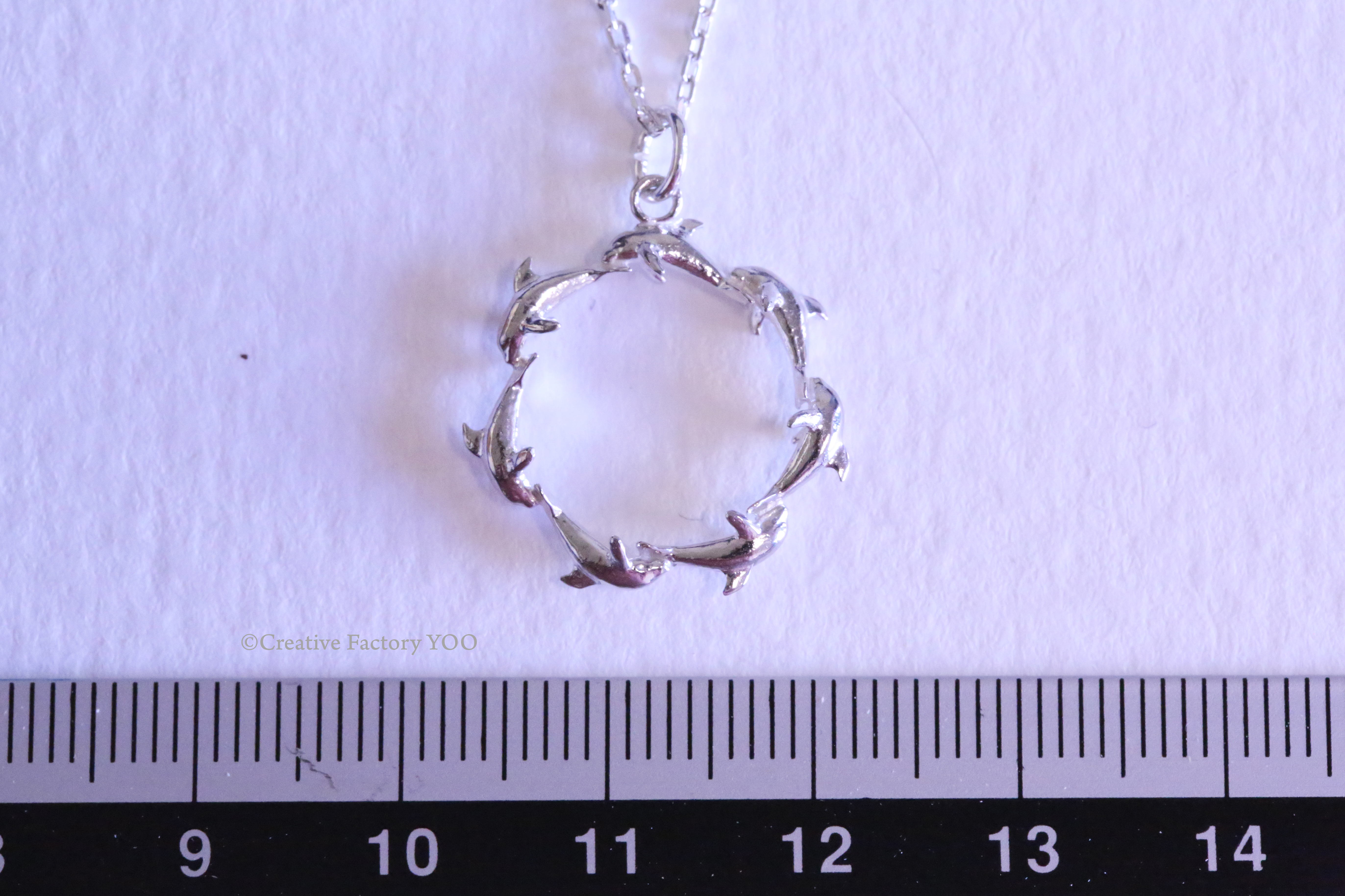  Seven Dolphin Pendant with Chain