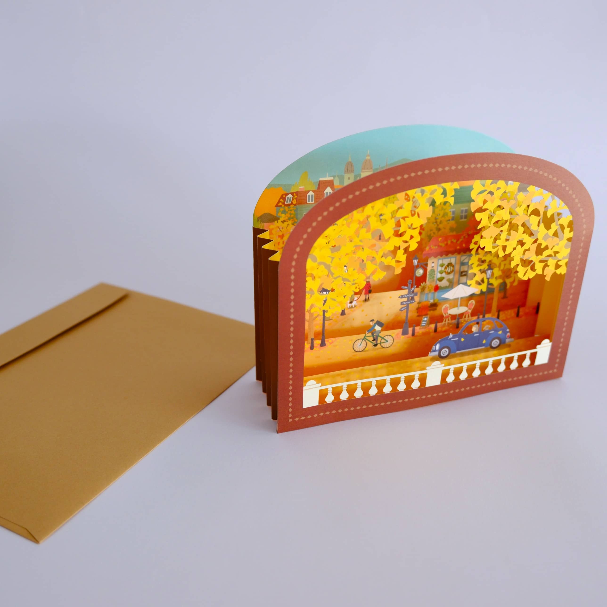 Postal Decorativa Ciudad con Ginkgo