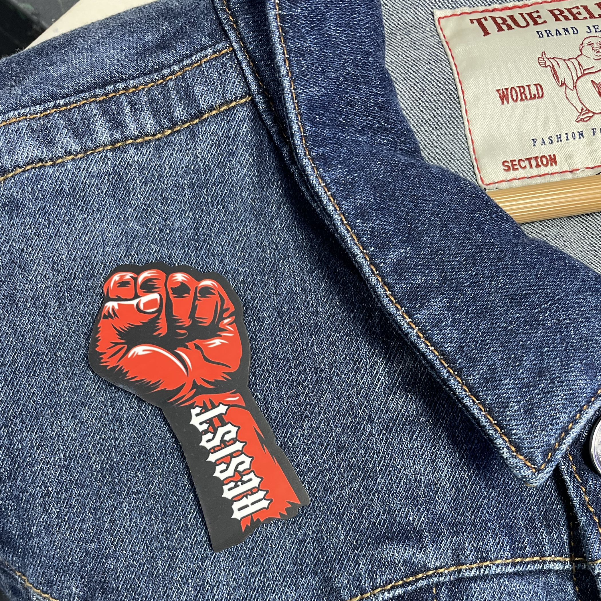 Resist - Woodcut Button