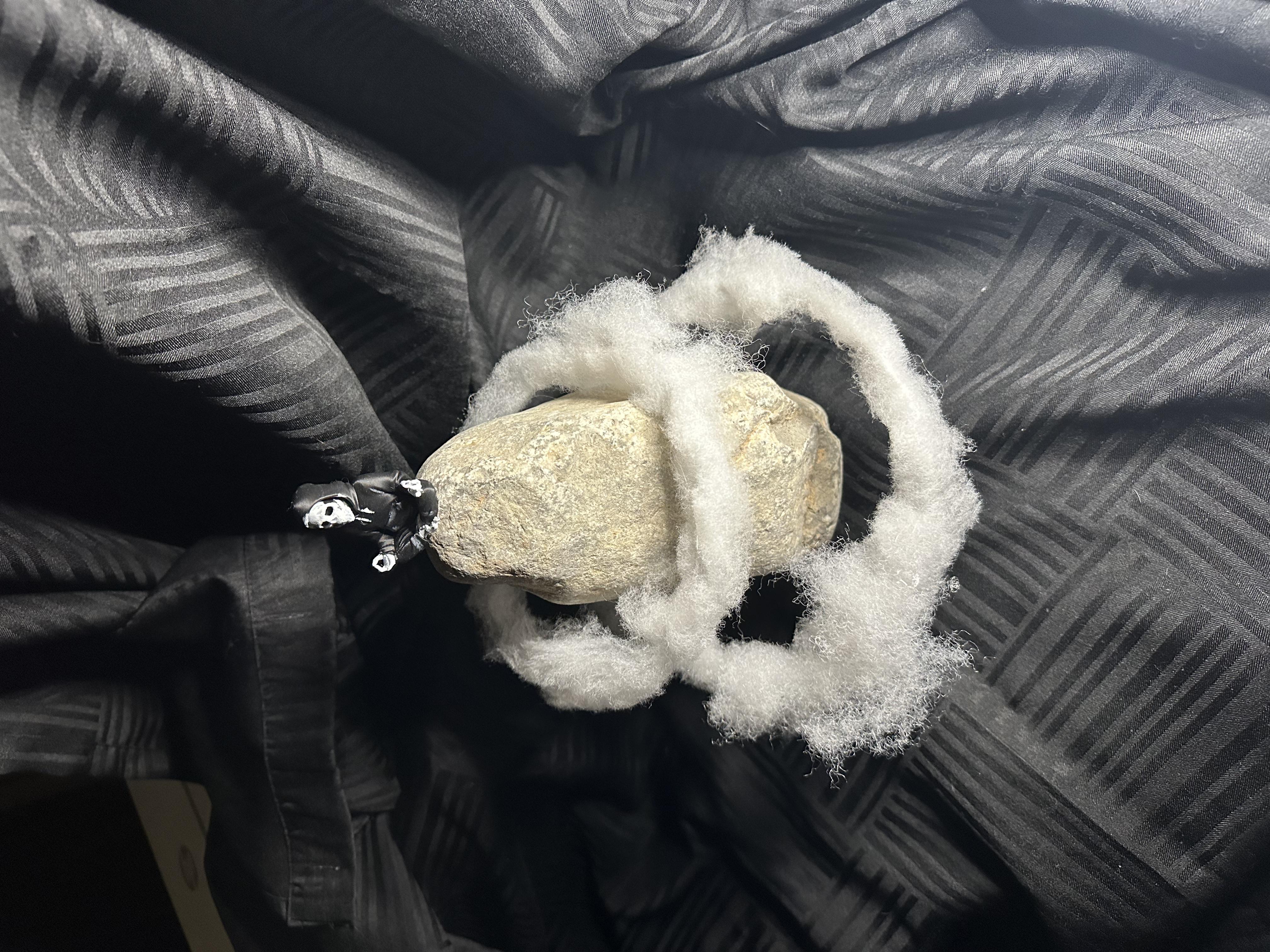 Decorative Rock with Skeleton Figurine