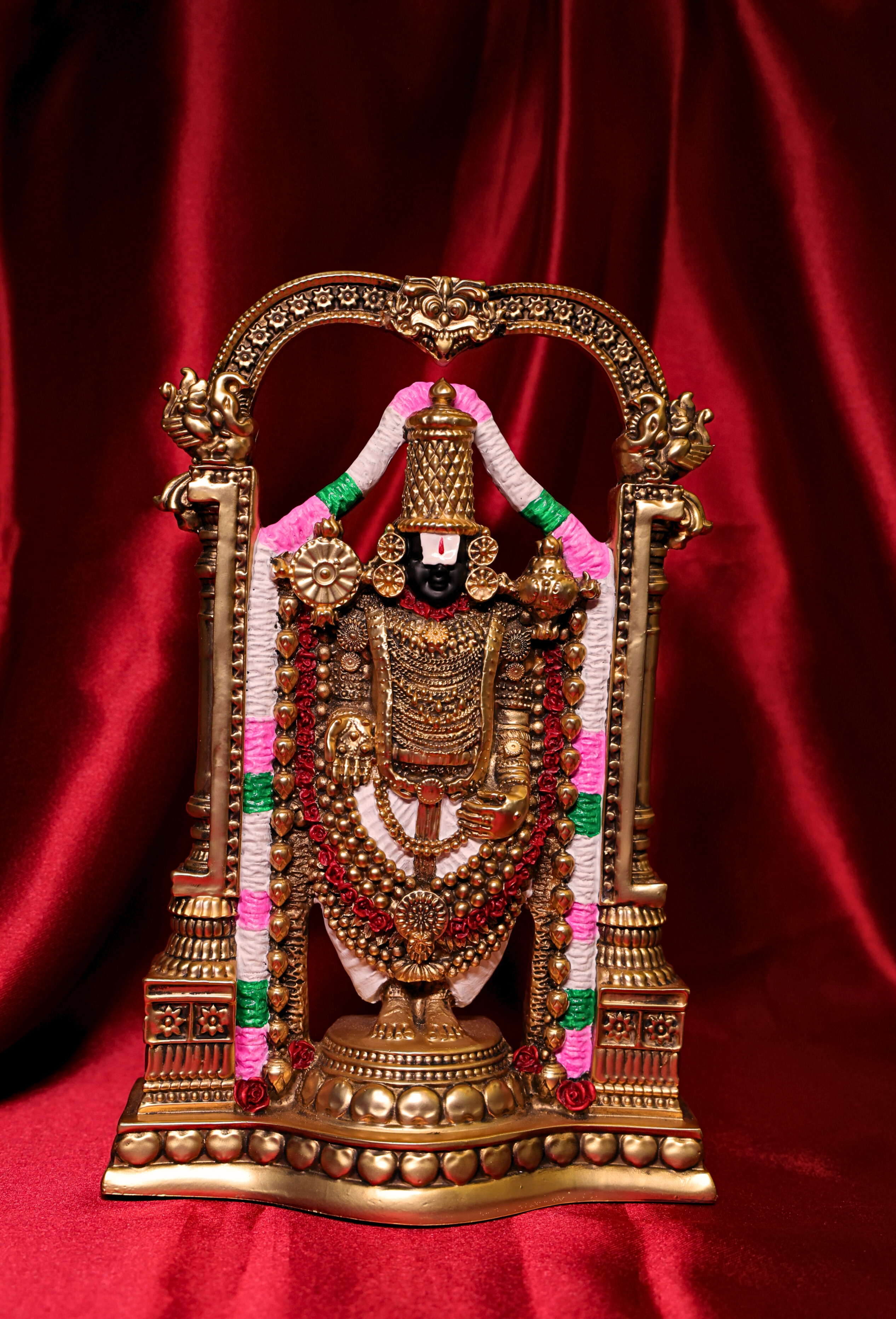 Swarna Venkatesha under the Kirtimukha Arch