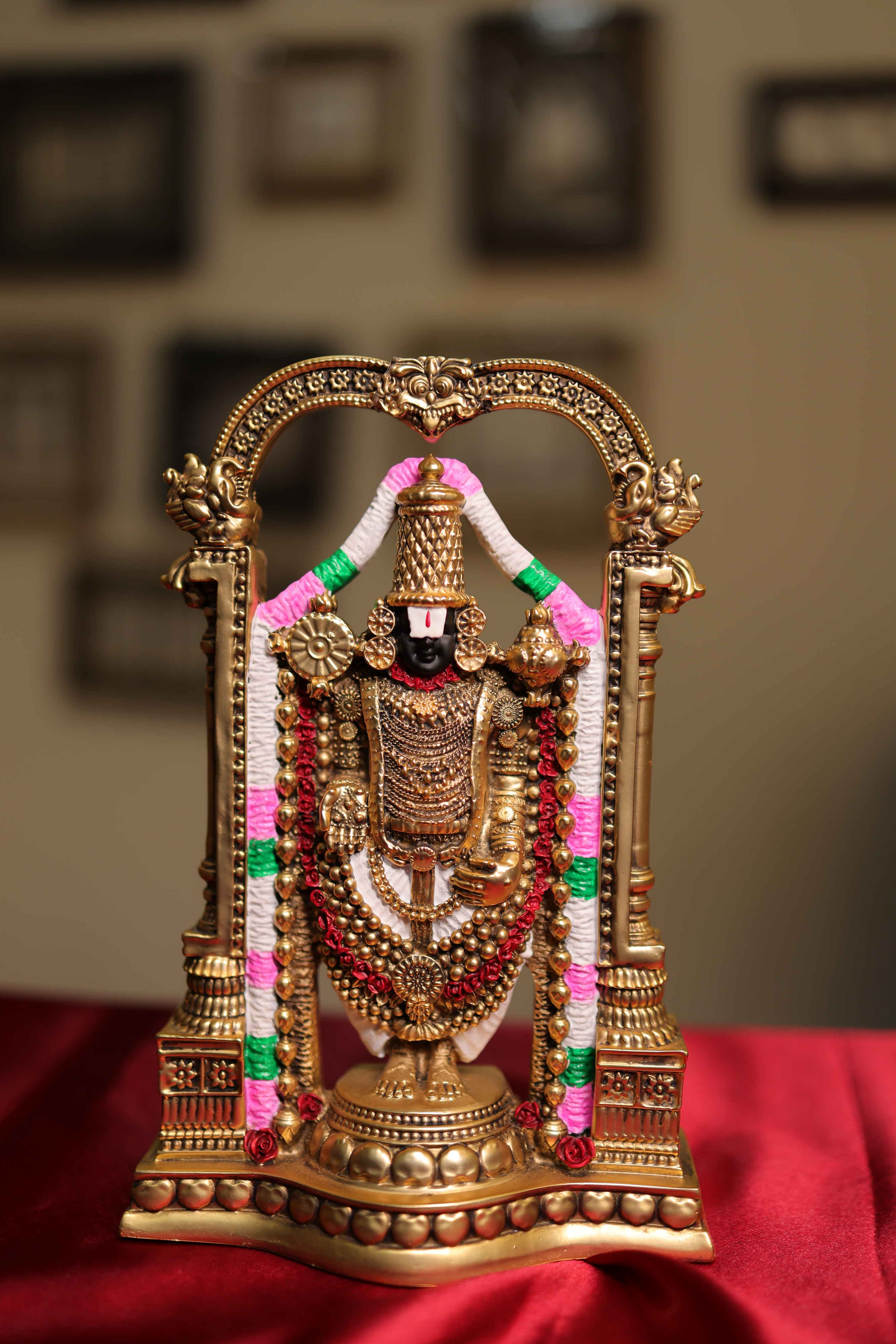 Swarna Venkatesha under the Kirtimukha Arch