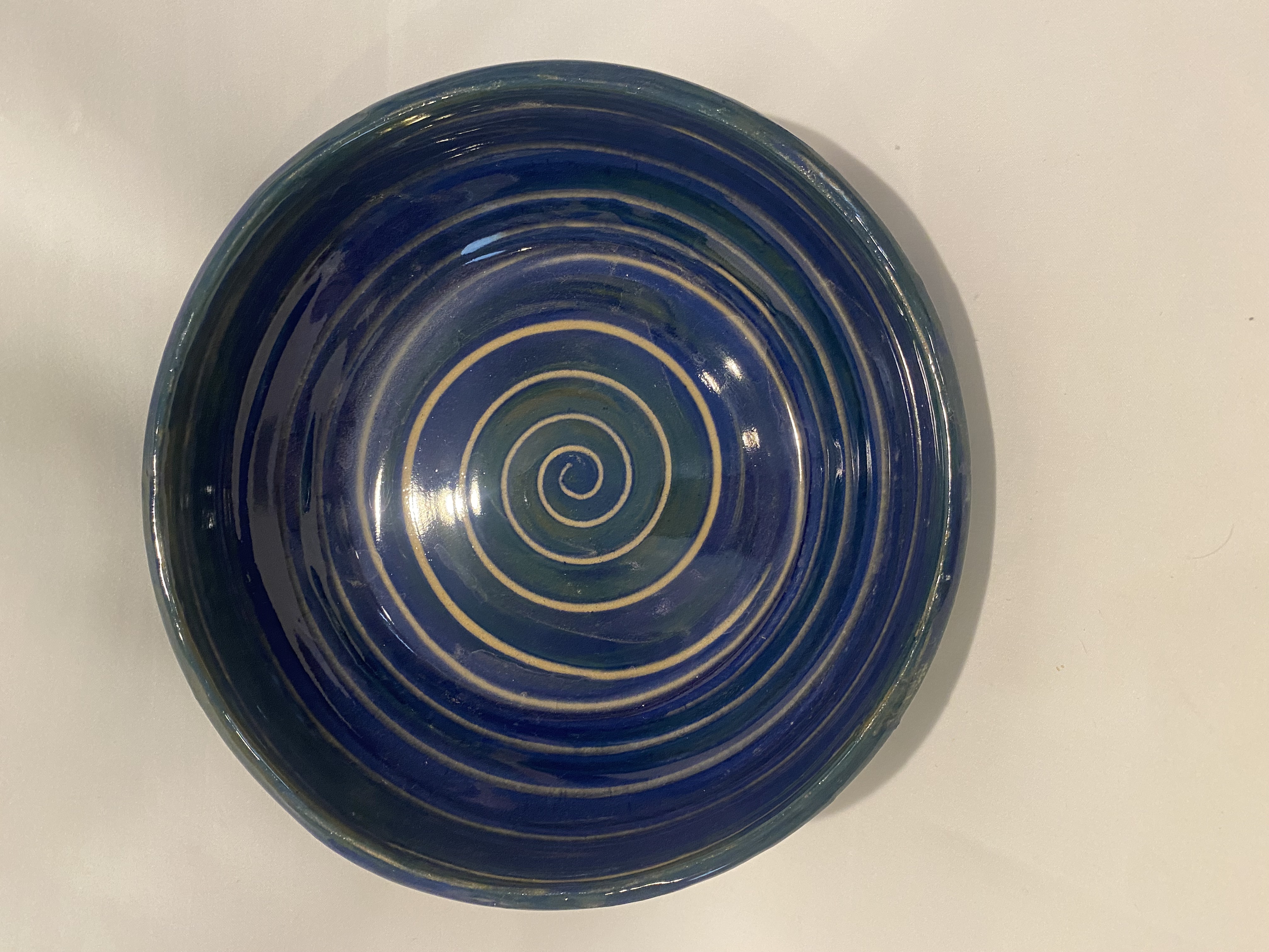 Deep blue and green swirl serving bowl