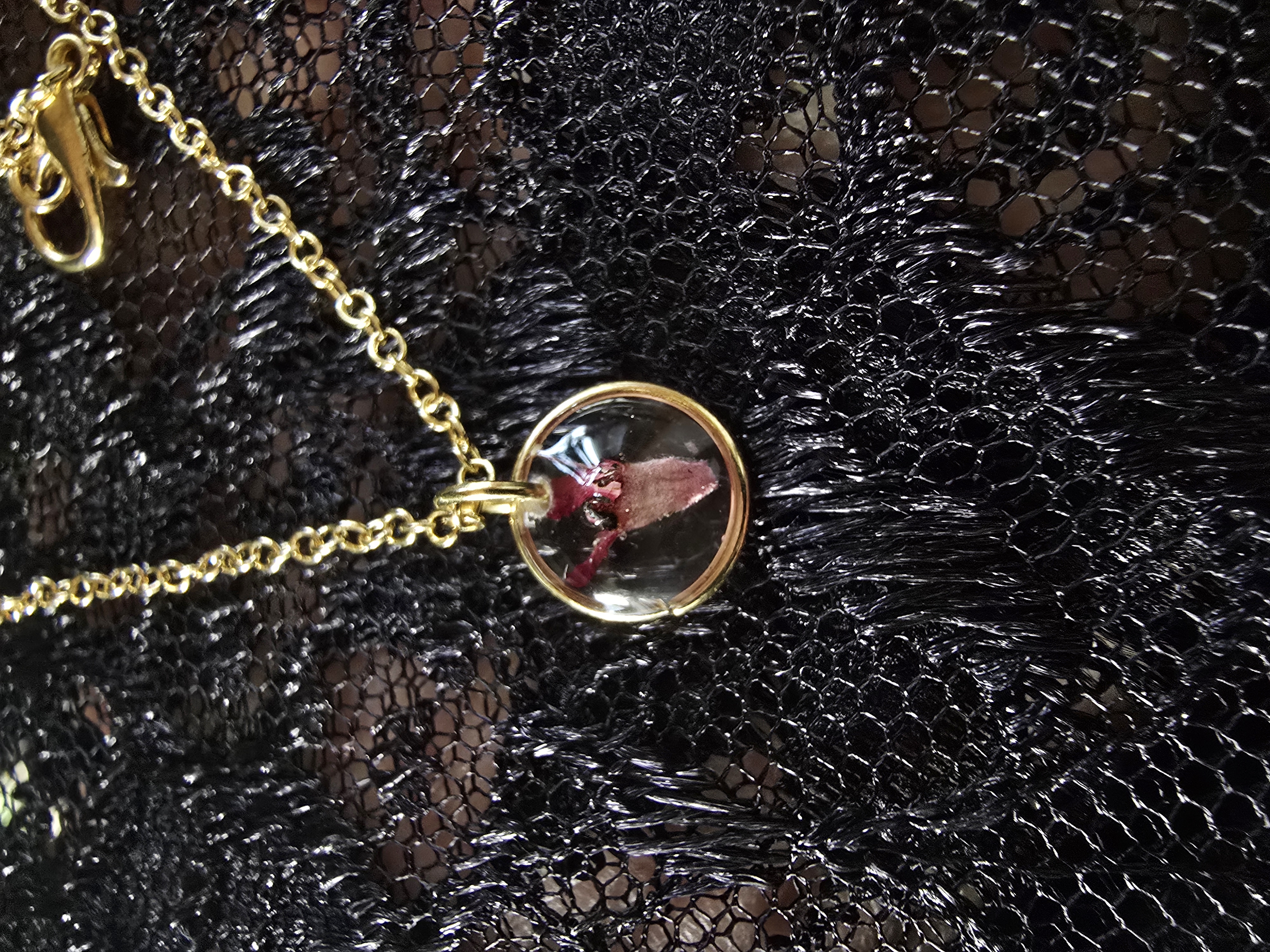 Mini gold pendant necklace featuring a real tiny Lantana flower