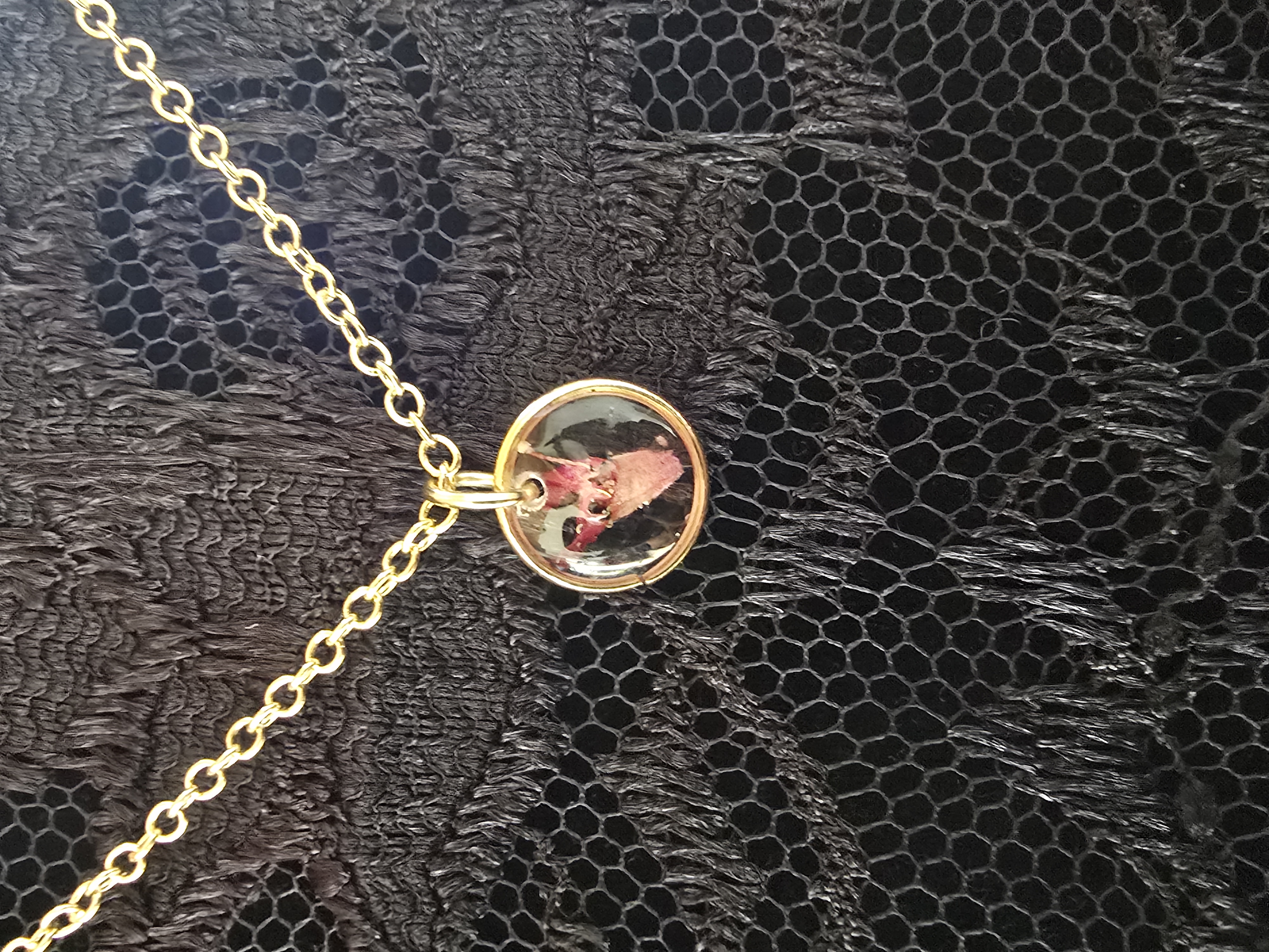 Mini gold pendant necklace featuring a real tiny Lantana flower