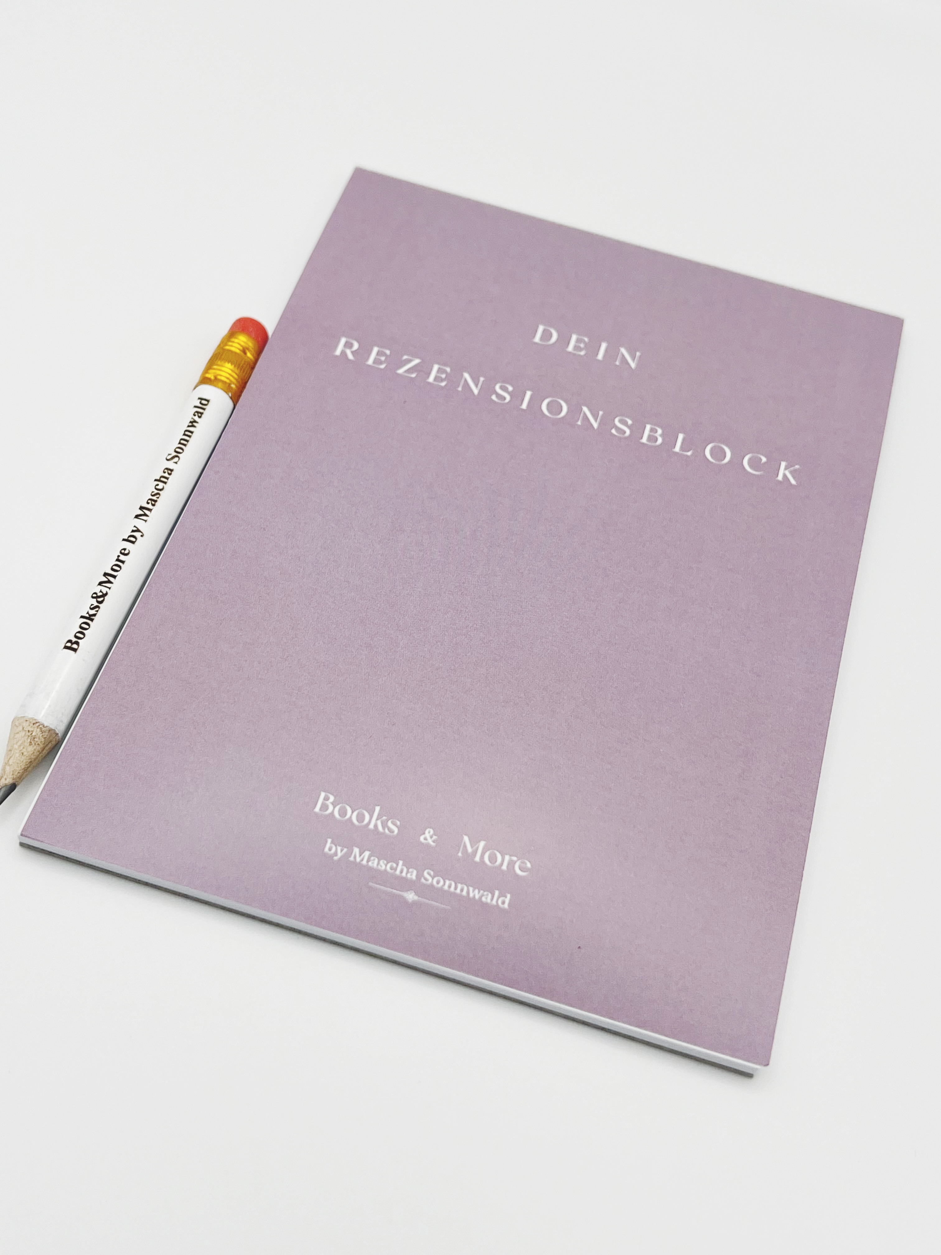 Rezensionsblock mit Bleistift