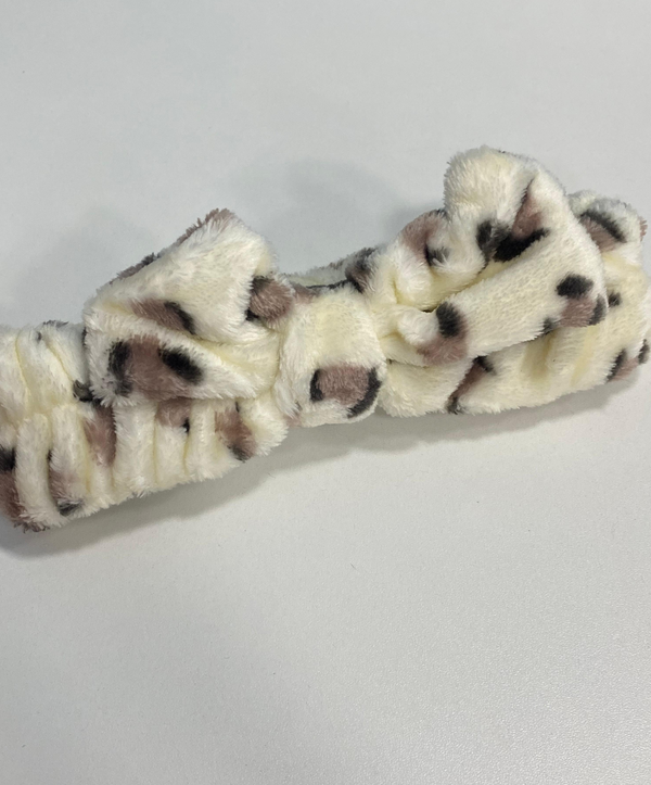 Faixa de cabelo de pelúcia