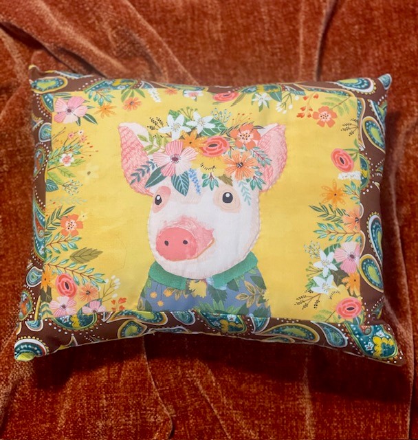 Pig-themed decorative pillow