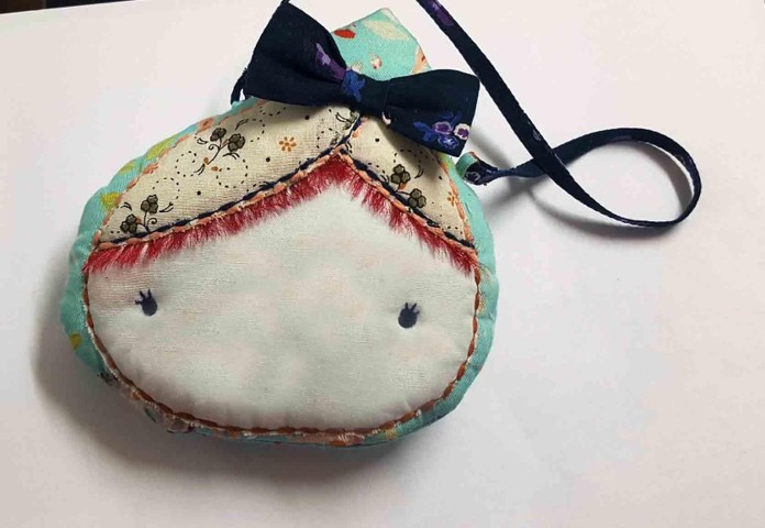 Handmade Face-Shaped Pouch