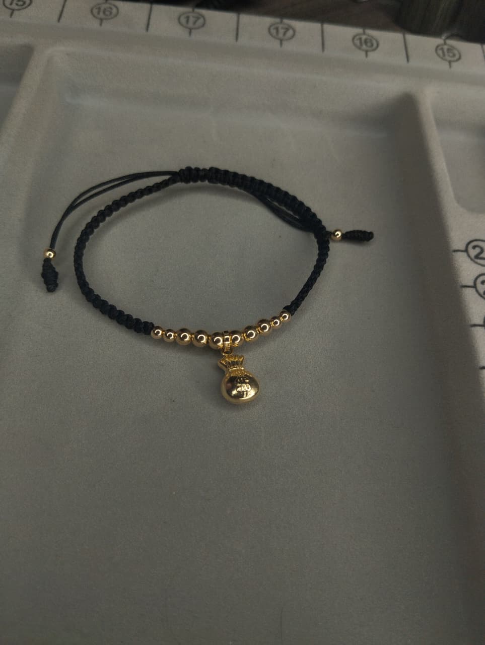 PULSERA DIJE BOLSA DINERO DESCENDENTE