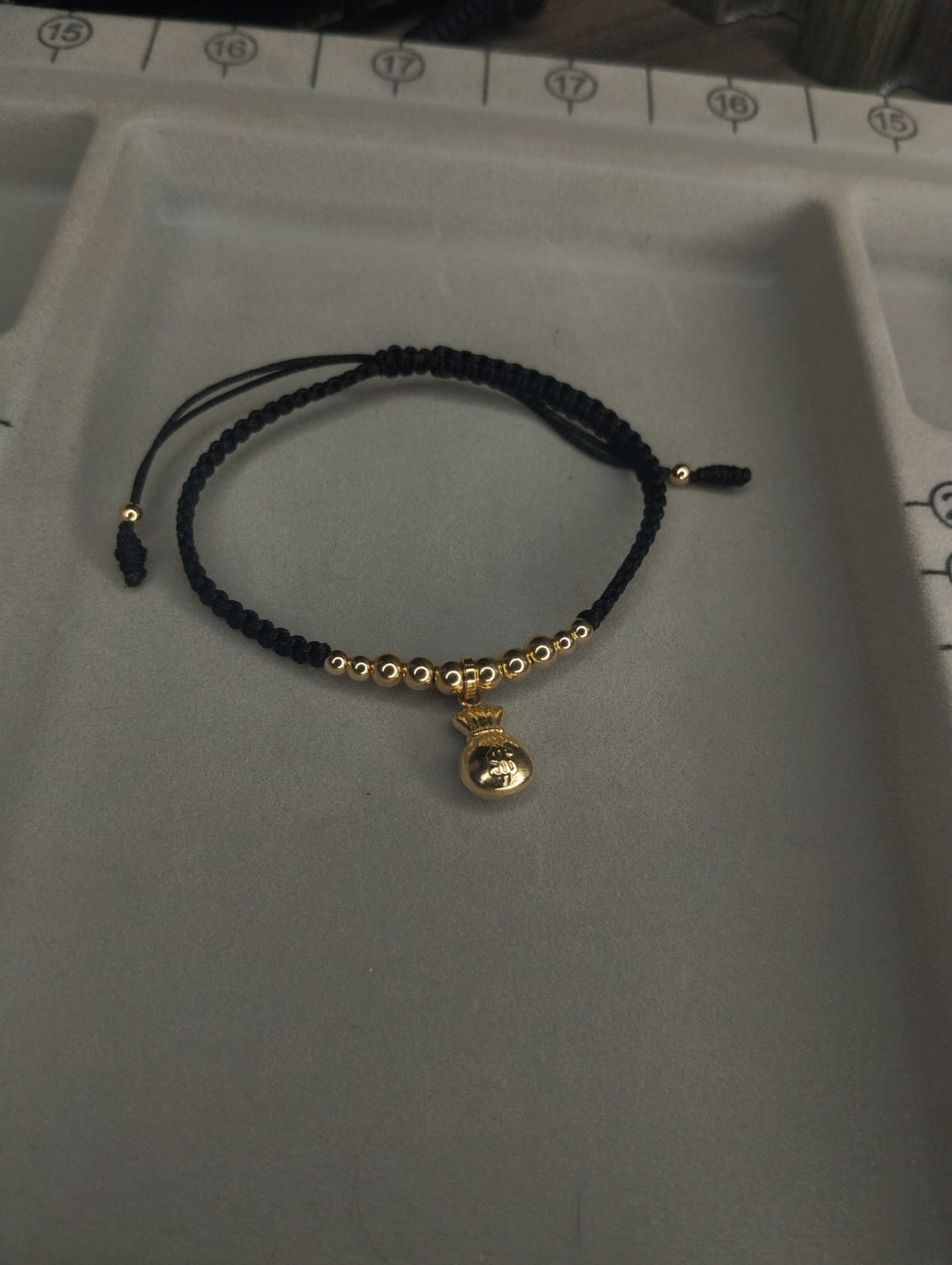 PULSERA DIJE BOLSA DINERO DESCENDENTE