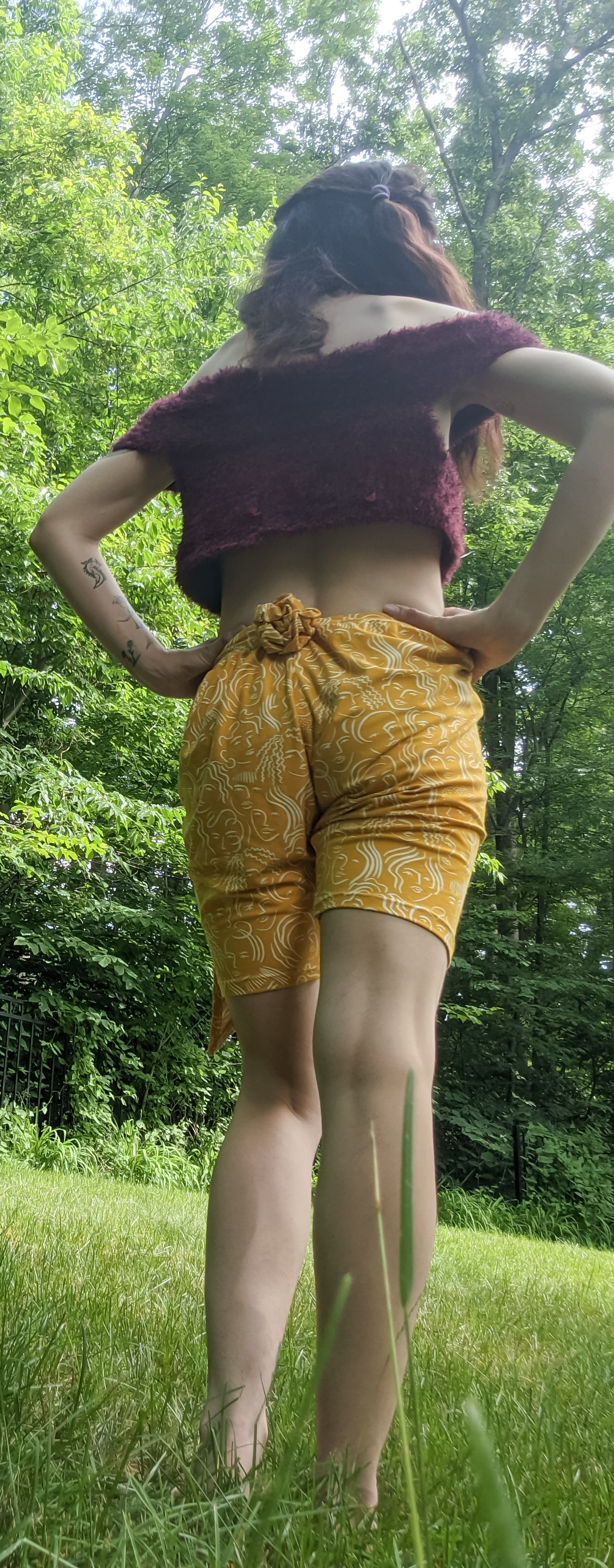 Face Print Skirt in Front Shorts in Back