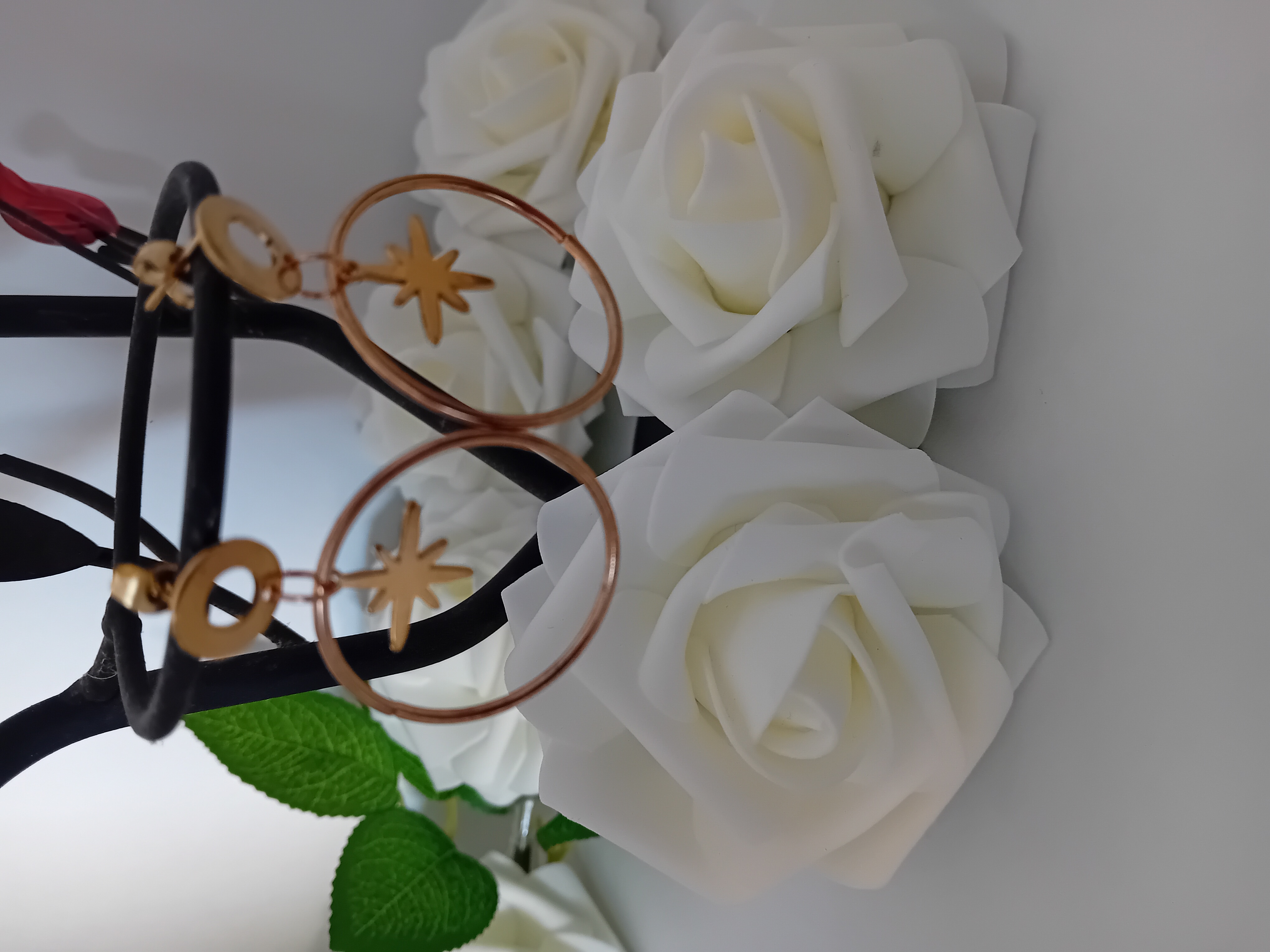 Boucles d'oreilles dorées étoile suspendue tout en élégance intemporelle