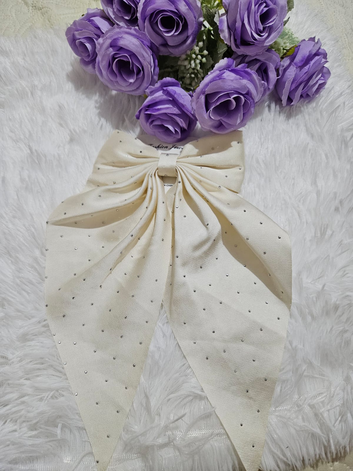 Moño blanco con brillos 