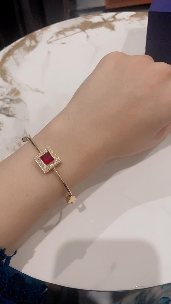 Elegant Gold Bangles with Red Gemstone