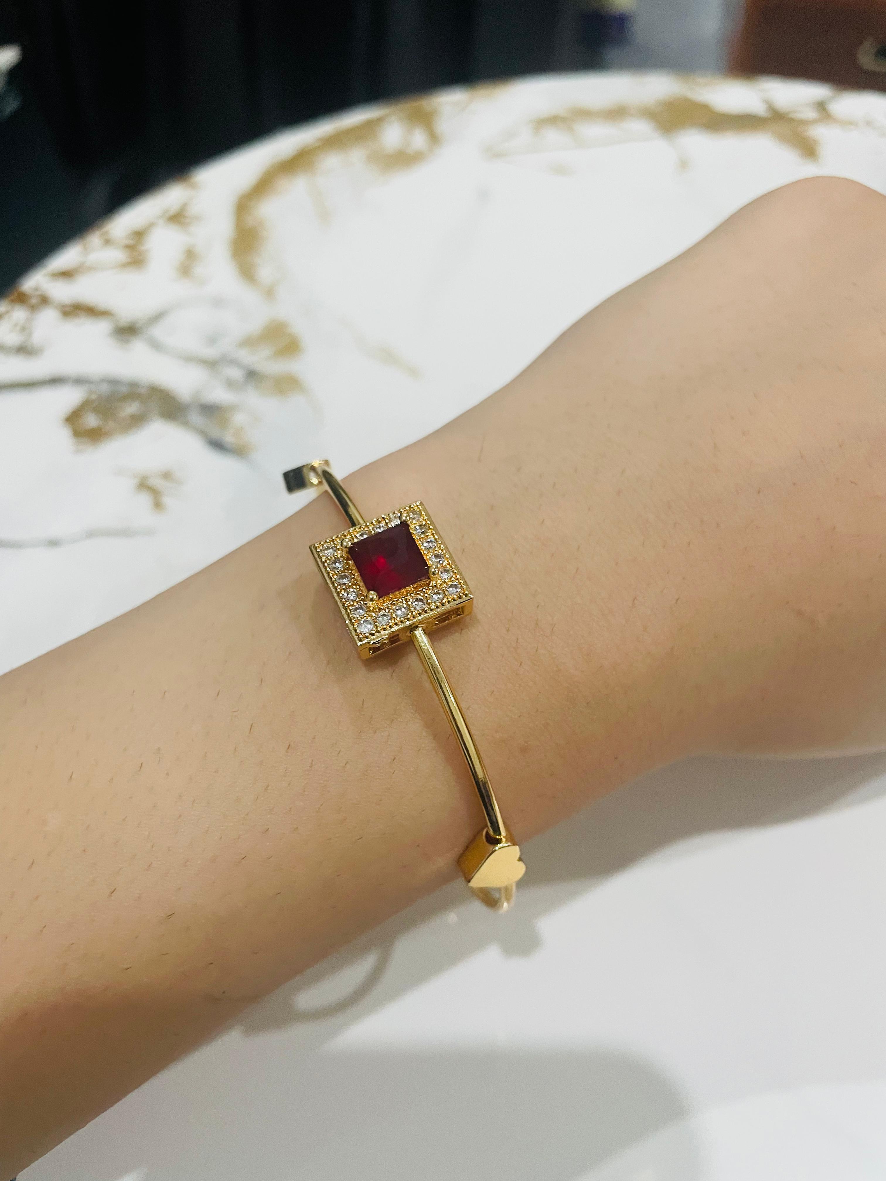 Elegant Gold Bangles with Red Gemstone