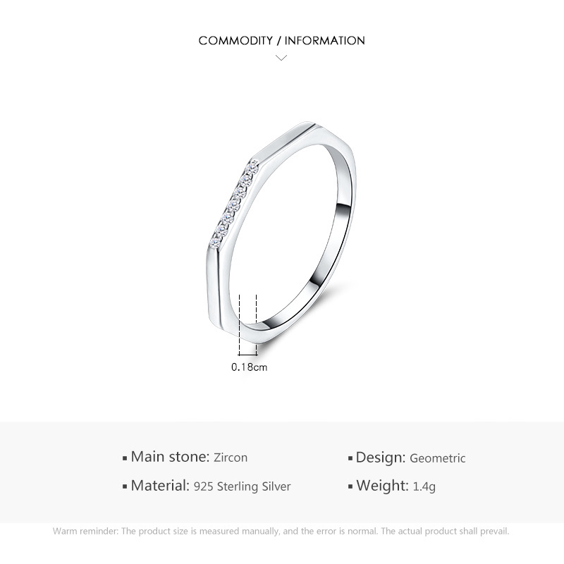 Anillo hexagonal con incrustaciones 