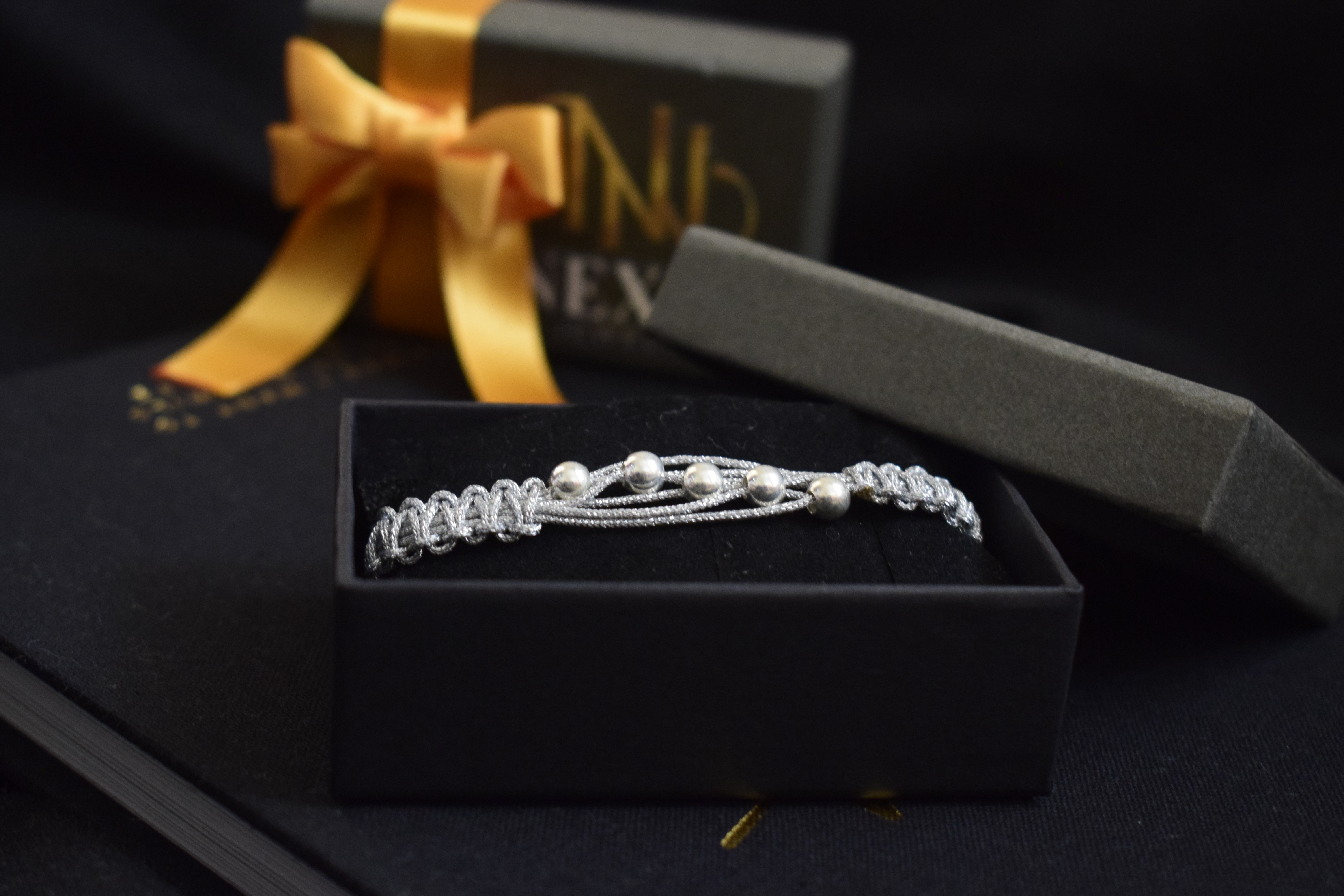 Pulsera tejida Cinco Caminos plata