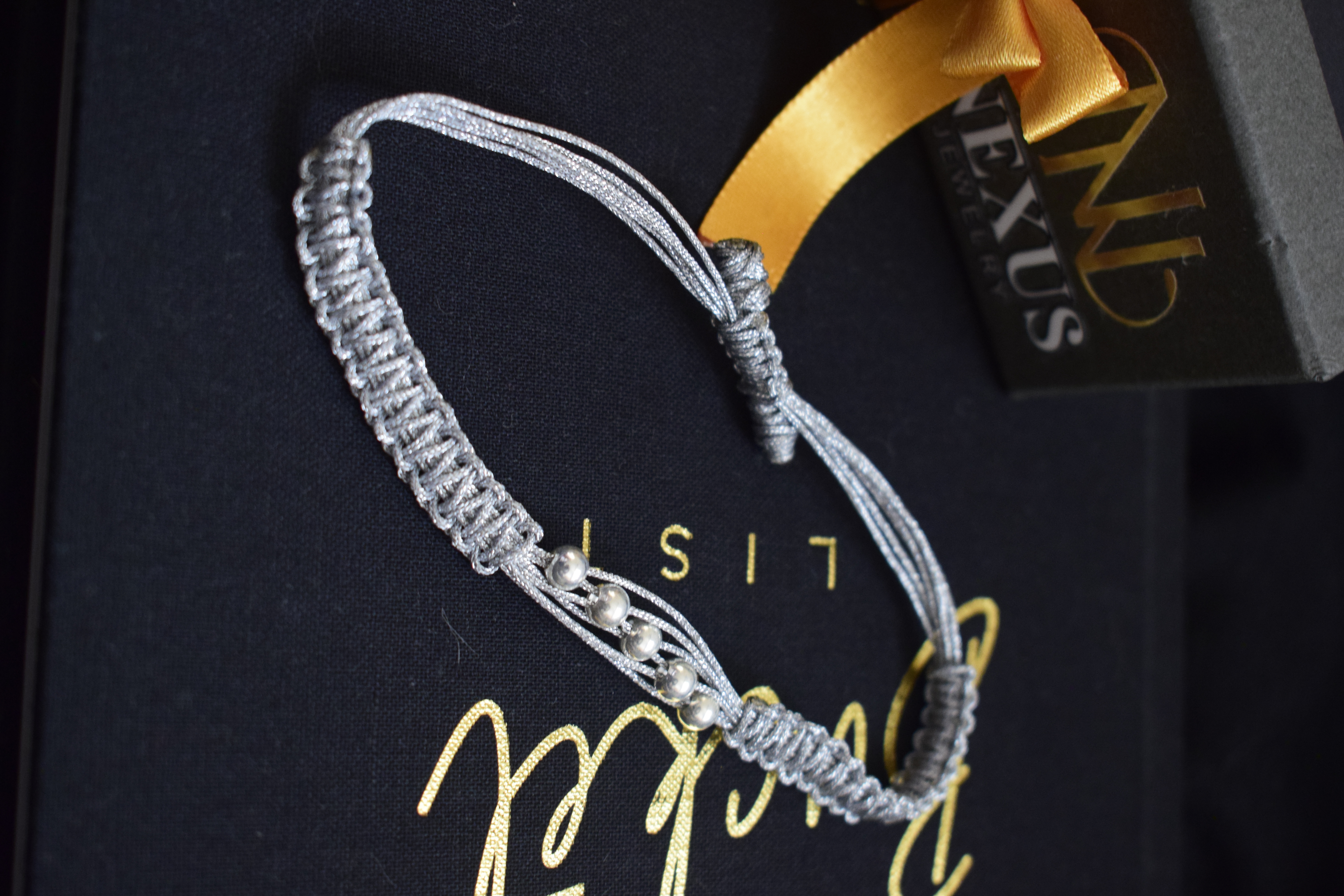 Pulsera tejida Cinco Caminos plata