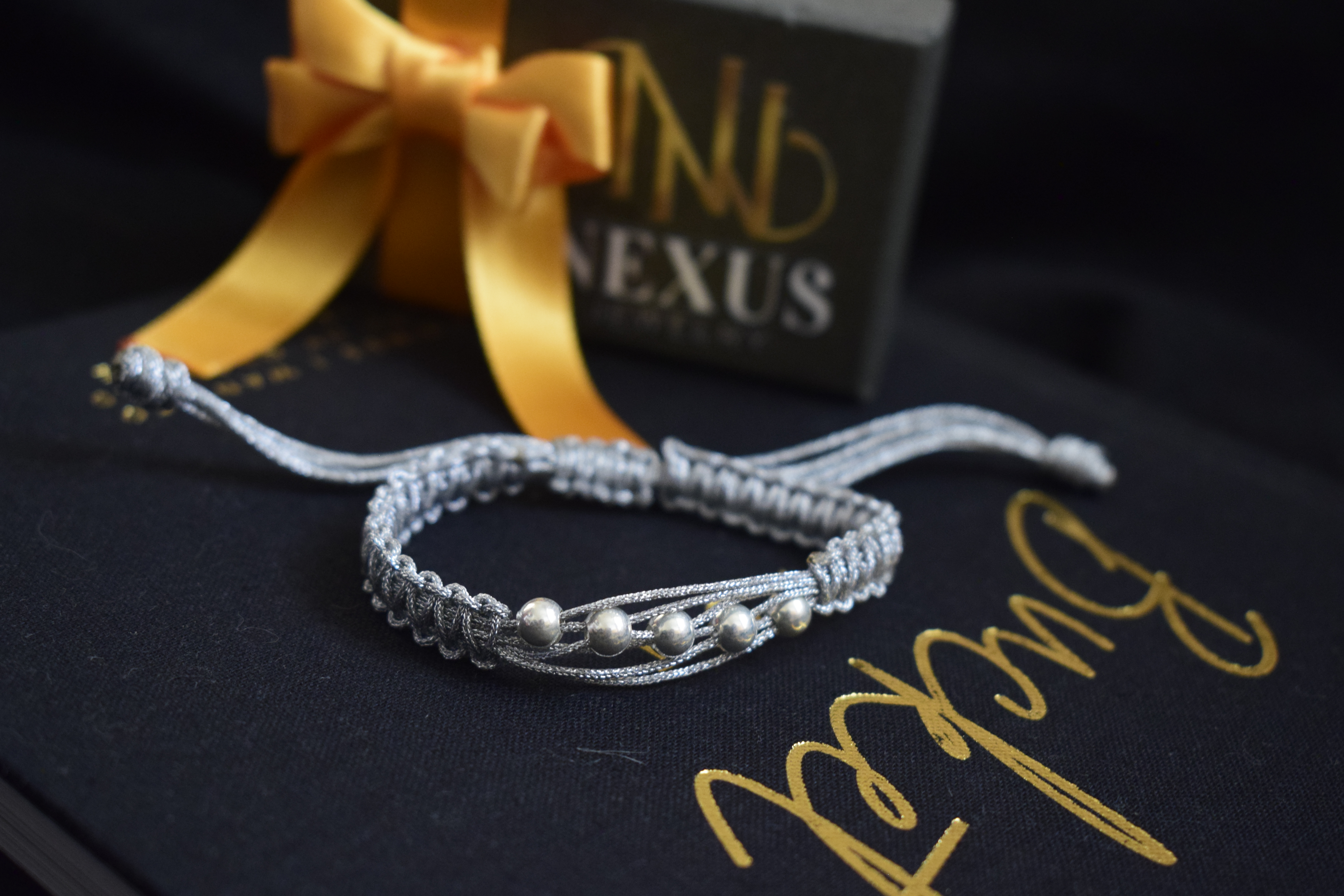 Pulsera tejida Cinco Caminos plata