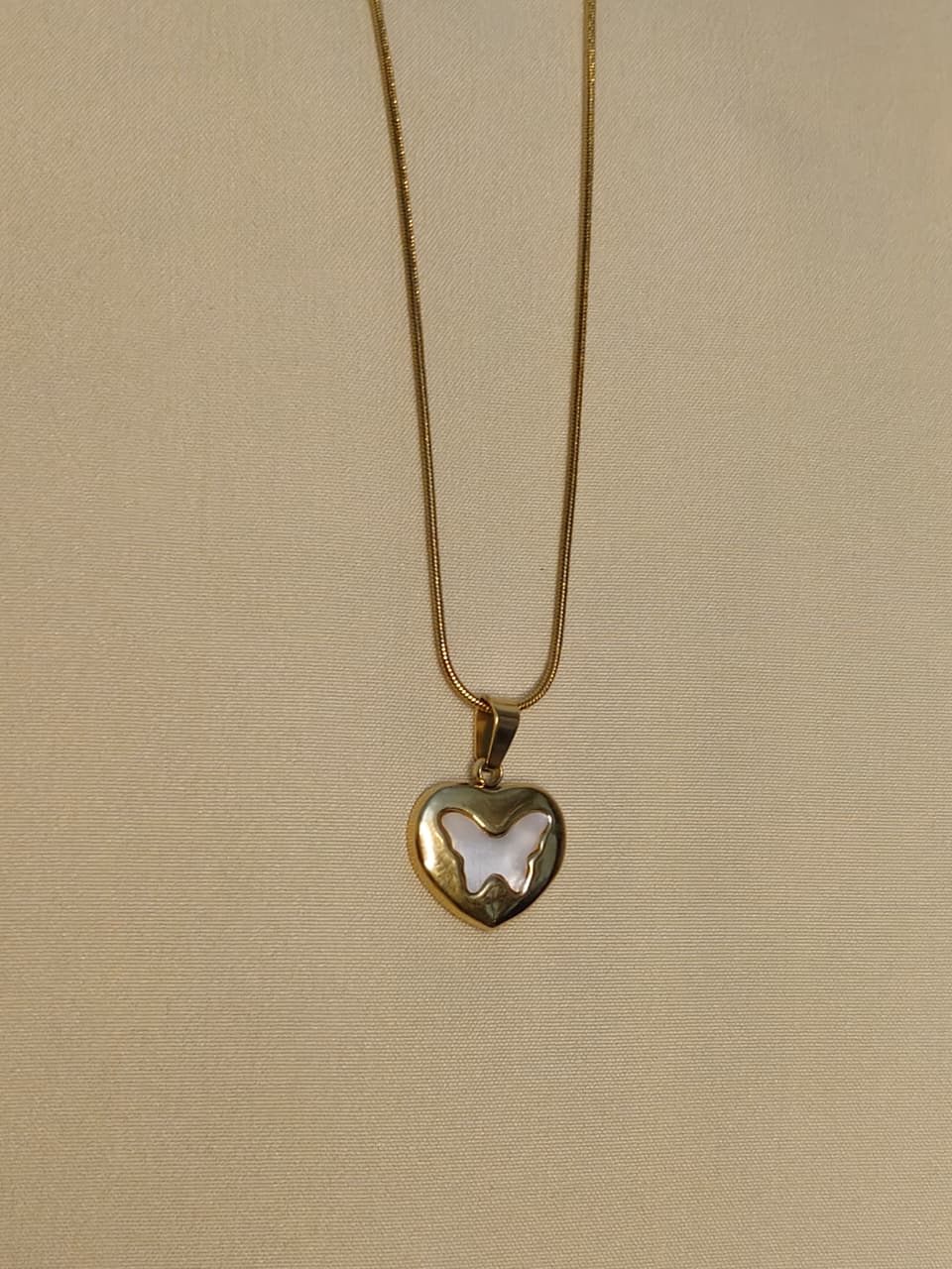 Gold heart-shaped butterfly pendant necklace