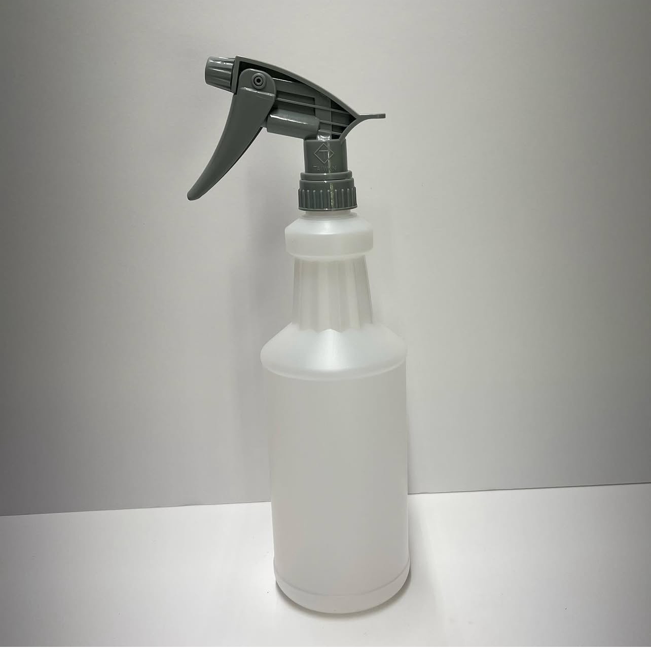 Plastic Spray Bottle and gray nozzle