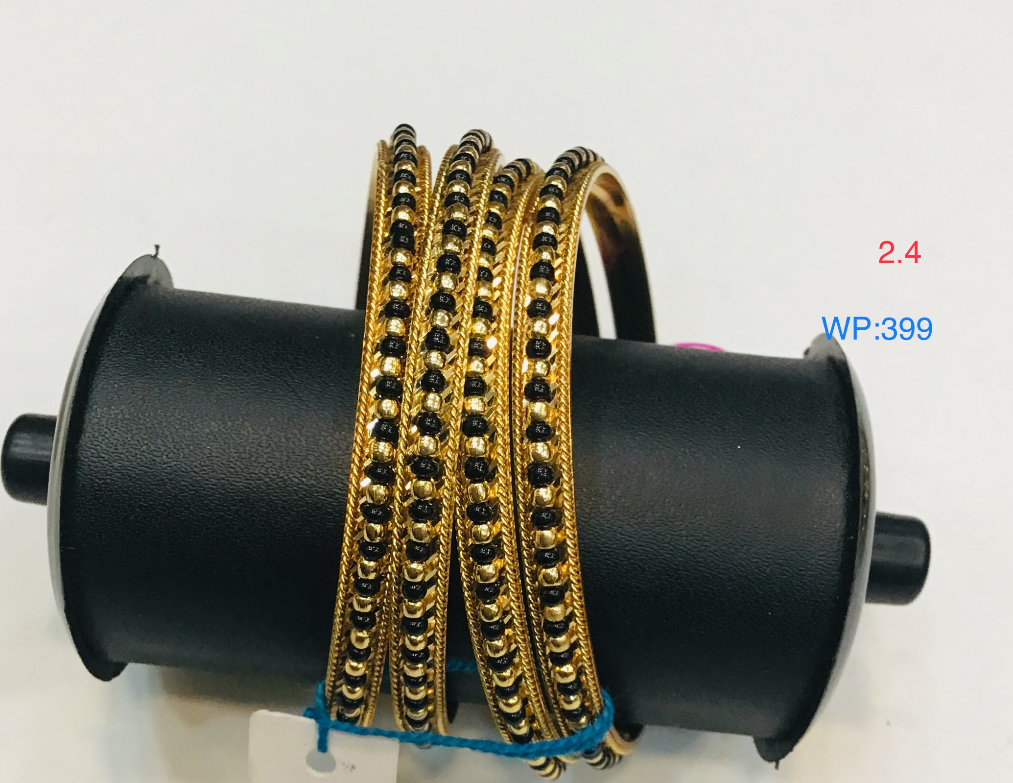 Traditional Gold-Plated Black Bead Bangles – Set of 4