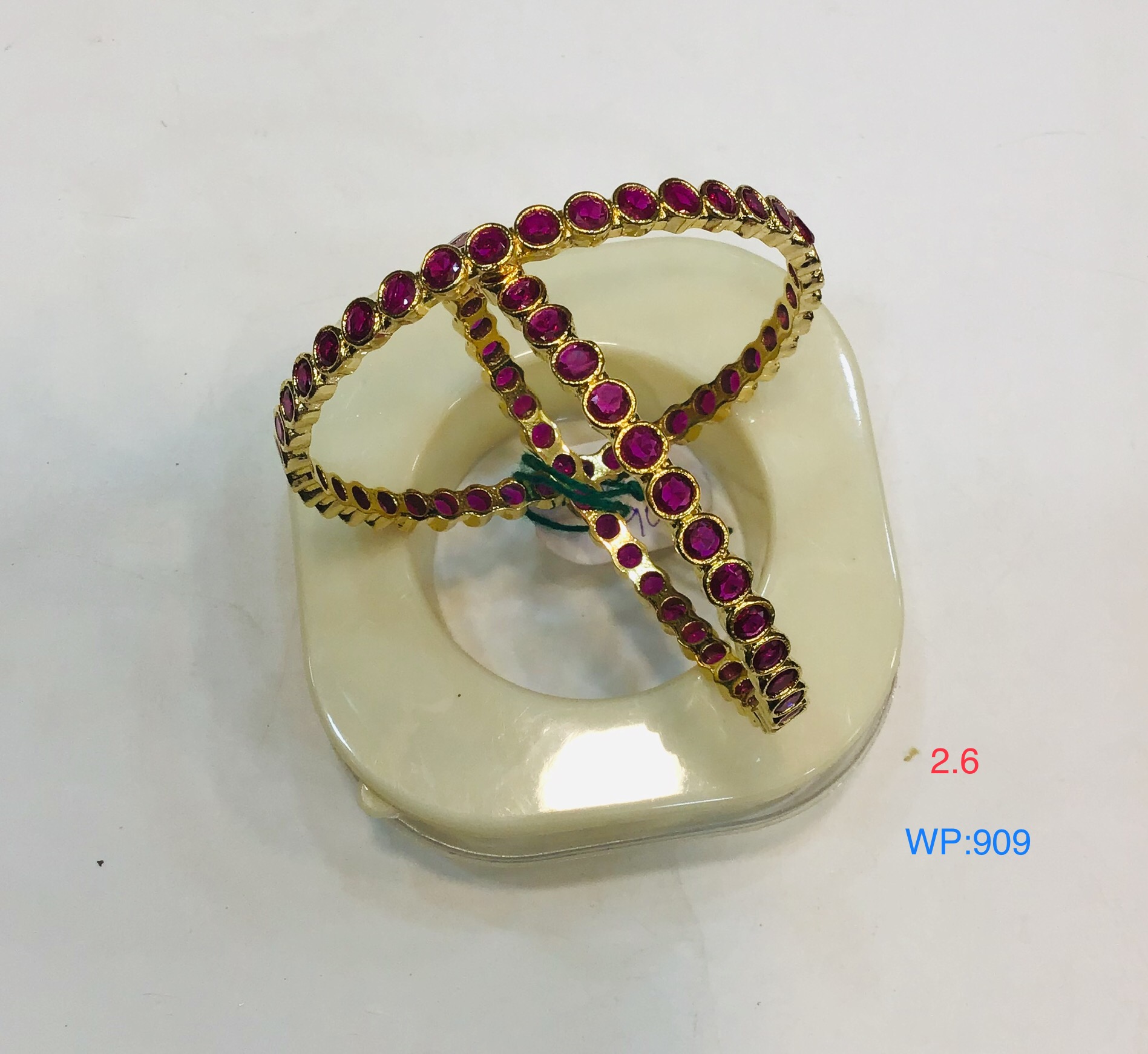 Elegant Gold Finish Bangles with Ruby Red Stones – Set of 2