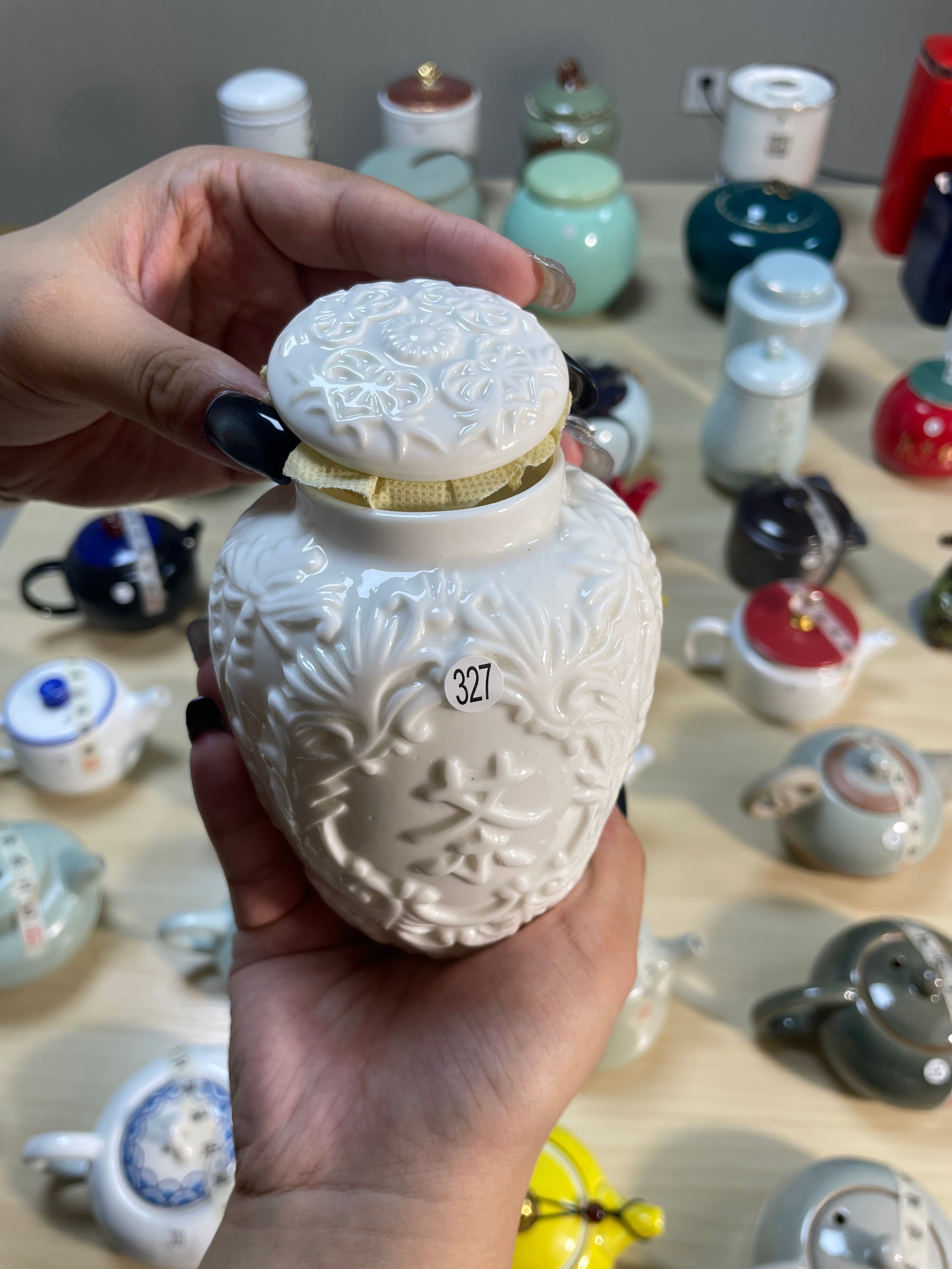 Ornate White Ceramic Jar
