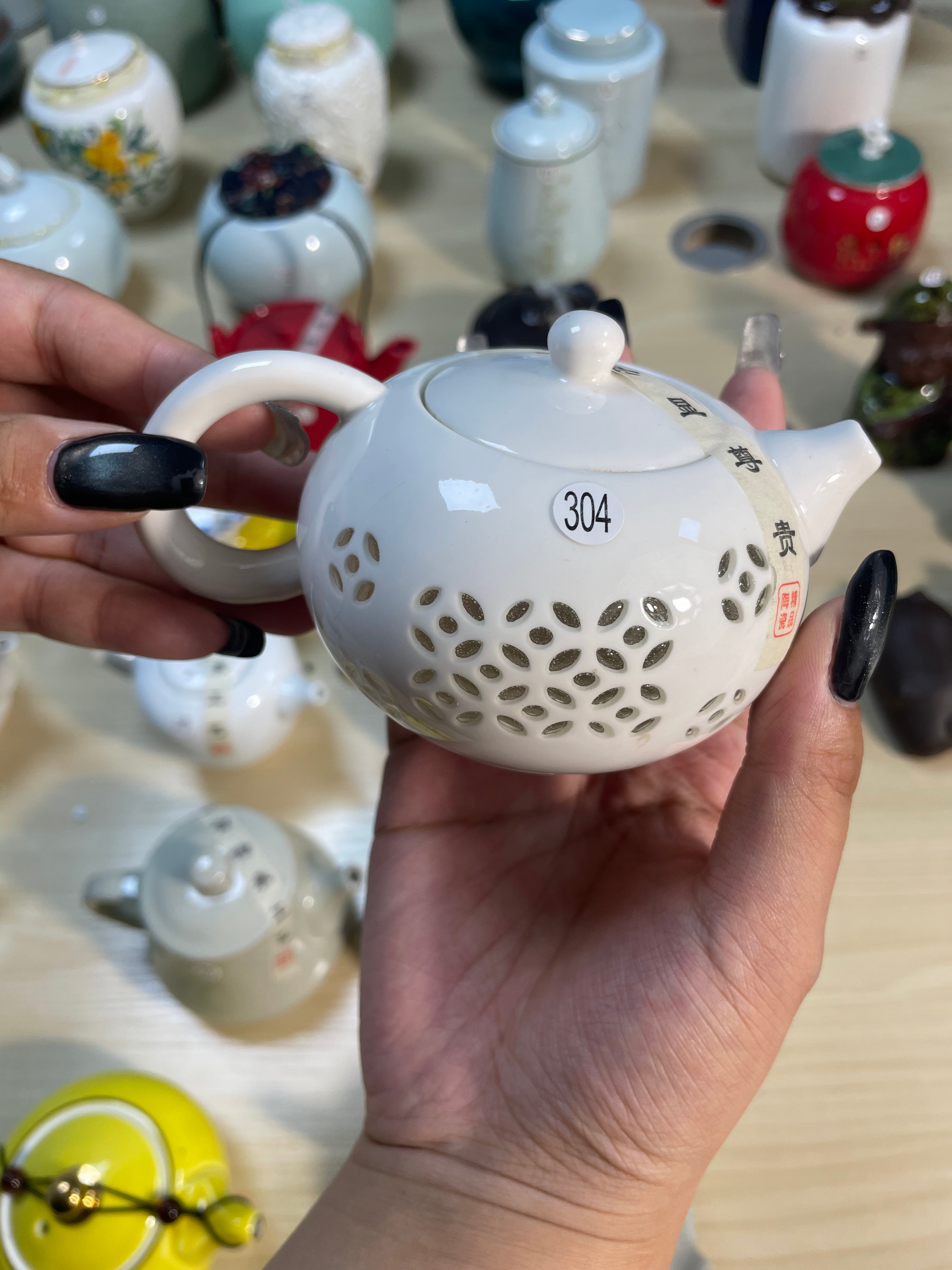 Porcelain Teapot with Cutout Design