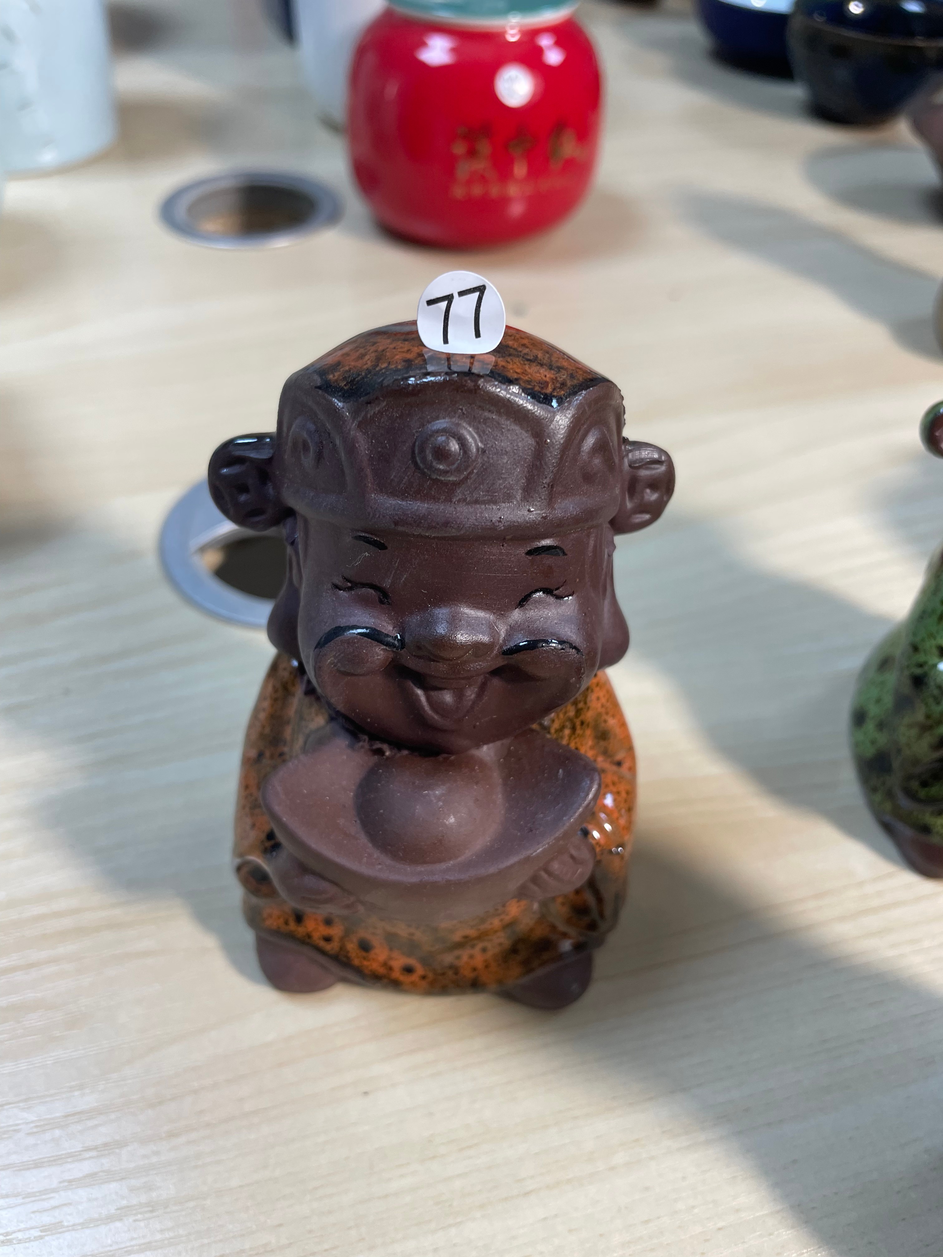 Ceramic Smiling Figurine